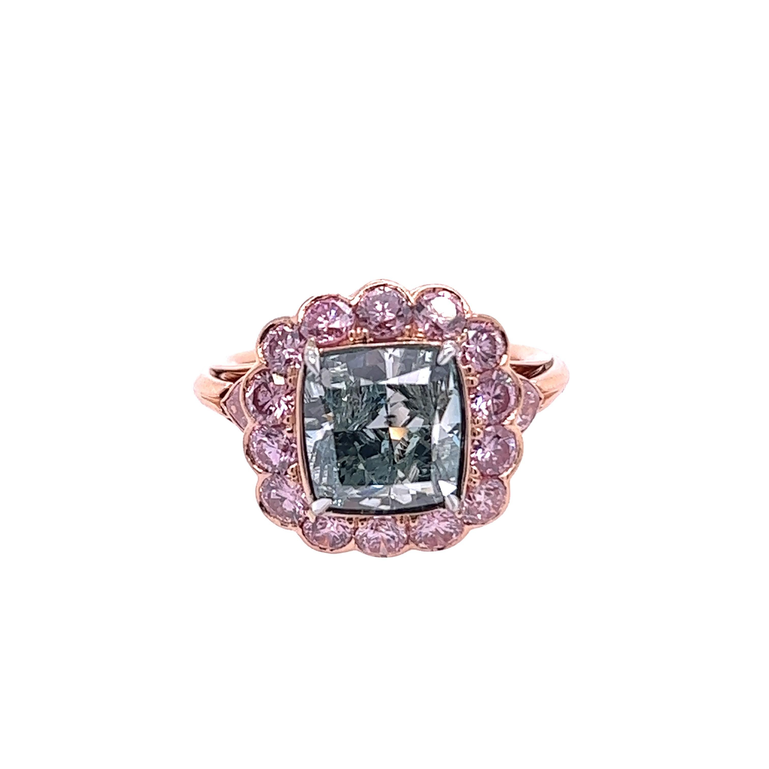 Rosenberg Diamonds & Co. 4.16 carat Cushion Cut Fancy Intense Bluish Green is accompanied by a GIA certificate. This  mesmerizing and rare cushion cut is set in a handmade 18k rose gold setting. This ring continues its elegance with a beautiful