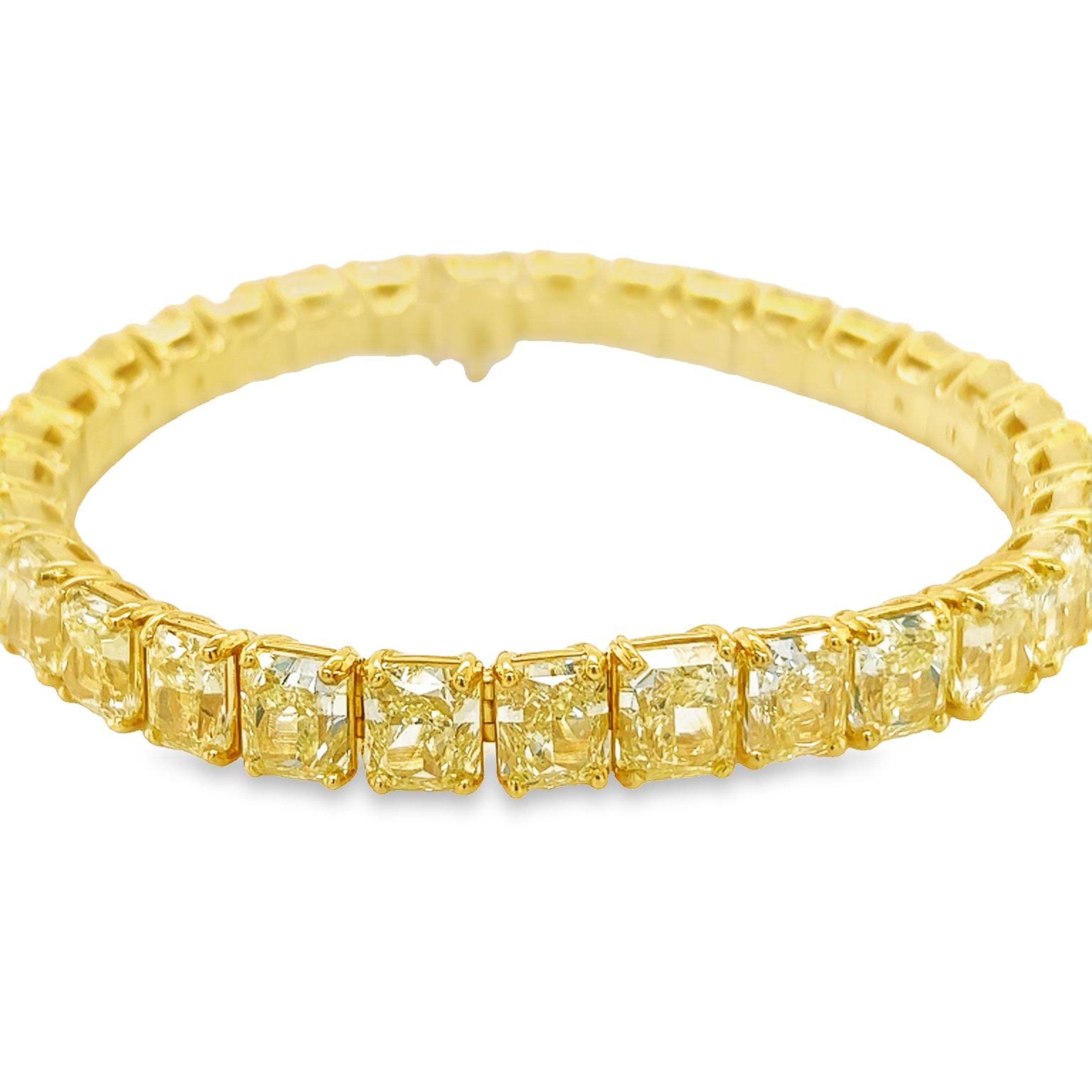 Rosenberg Diamonds & Co. 42.75 carat total weight Radiant cut diamond tennis bracelet. This gorgeous straight line bracelet consists of 31 carefully matched Radiant cuts graduating from the center are 2 carats to just over 1 carat Fancy Yellow & VS