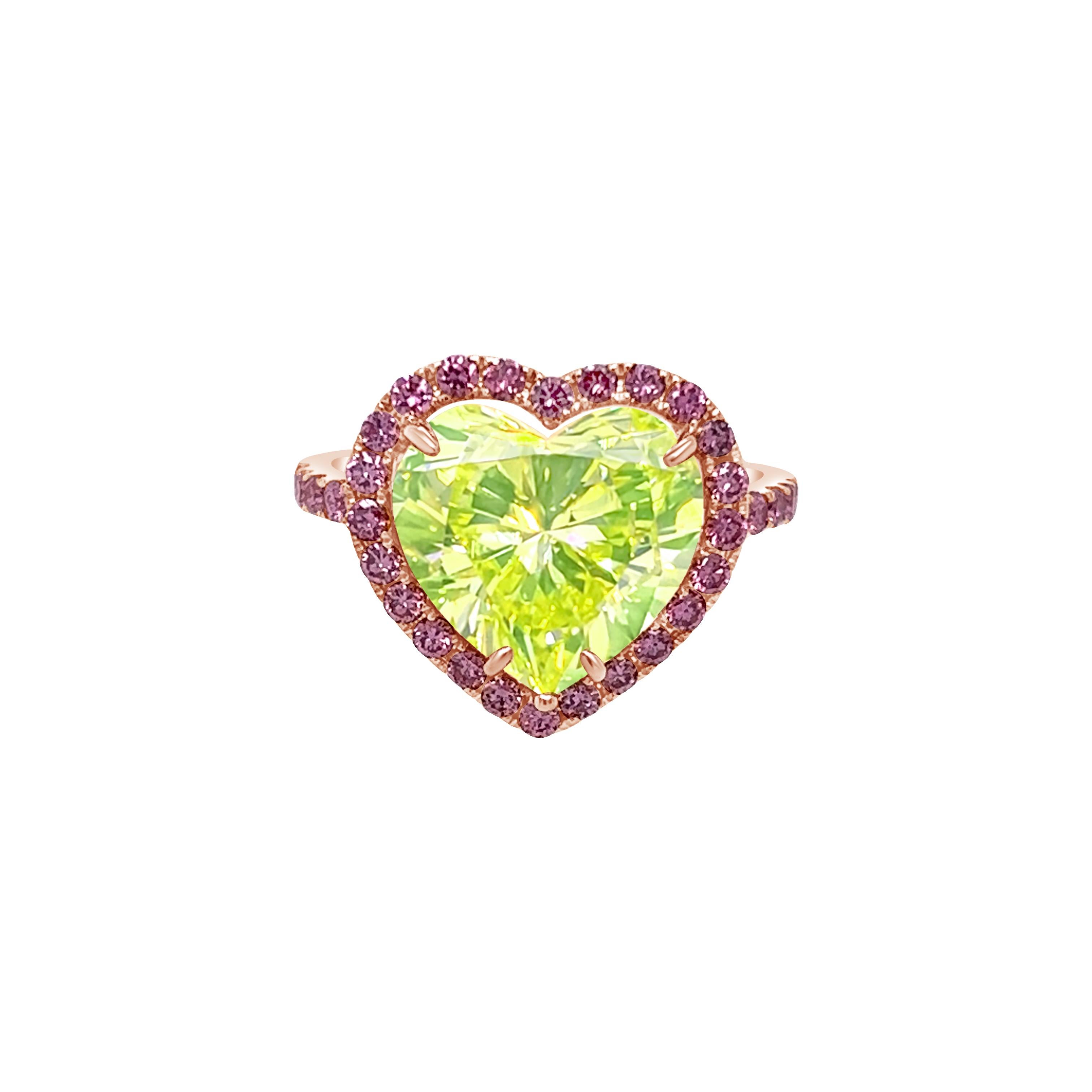 Rosenberg Diamonds & Co. 4.27 carat Heart Shape Fancy Vivid Green Yellow Diamond is accompanied by a GIA certificate. This mesmerizing and rare heart shape is set in a handmade 18k rose gold setting. This ring continues its elegance with a beautiful