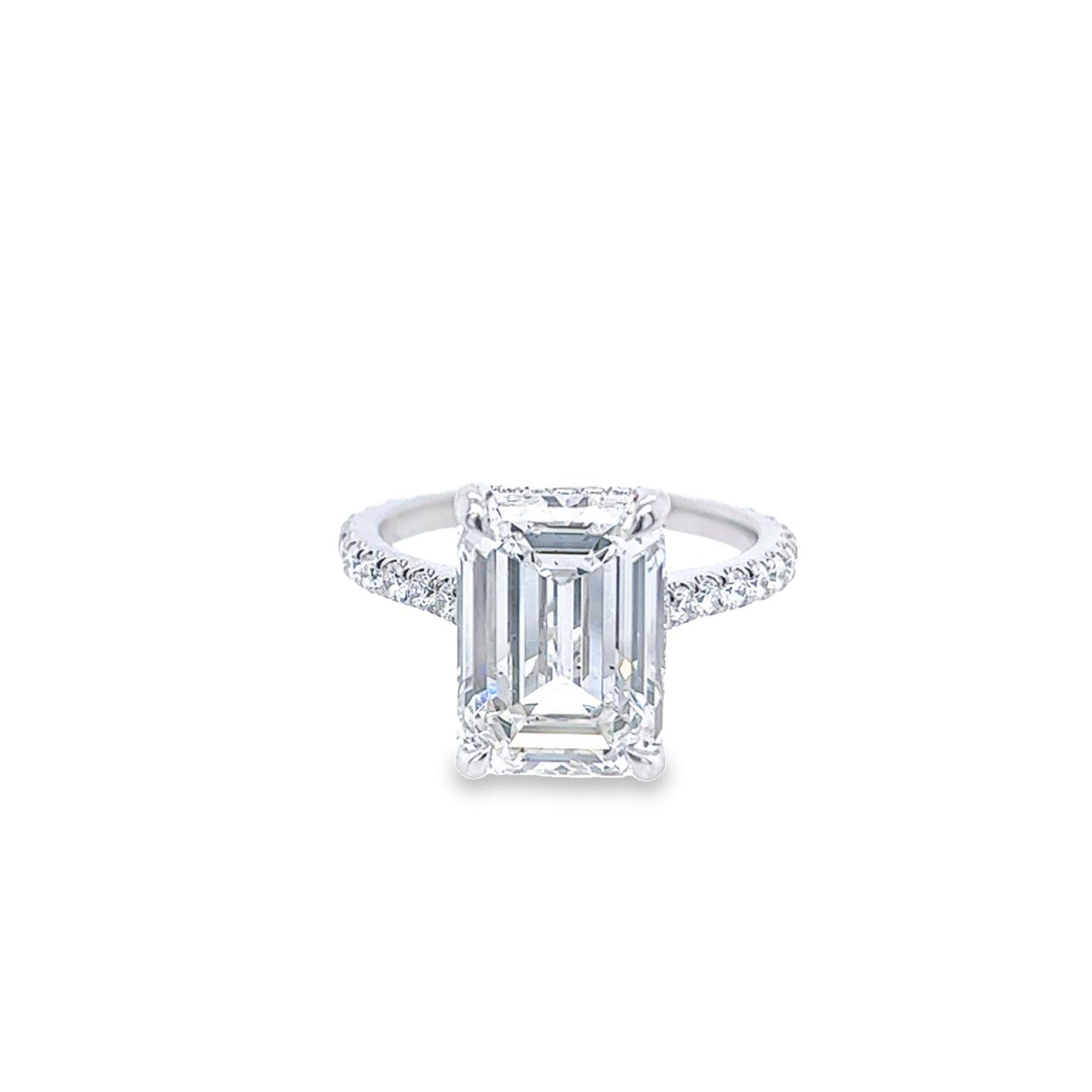 Rosenberg Diamonds & Co. 5.41 carat Emerald cut H color SI1 clarity is accompanied by a GIA certificate. This breathtaking Emerald is full of brilliance and an exceptional SI1 that is set in a handmade platinum setting and continues its elegance