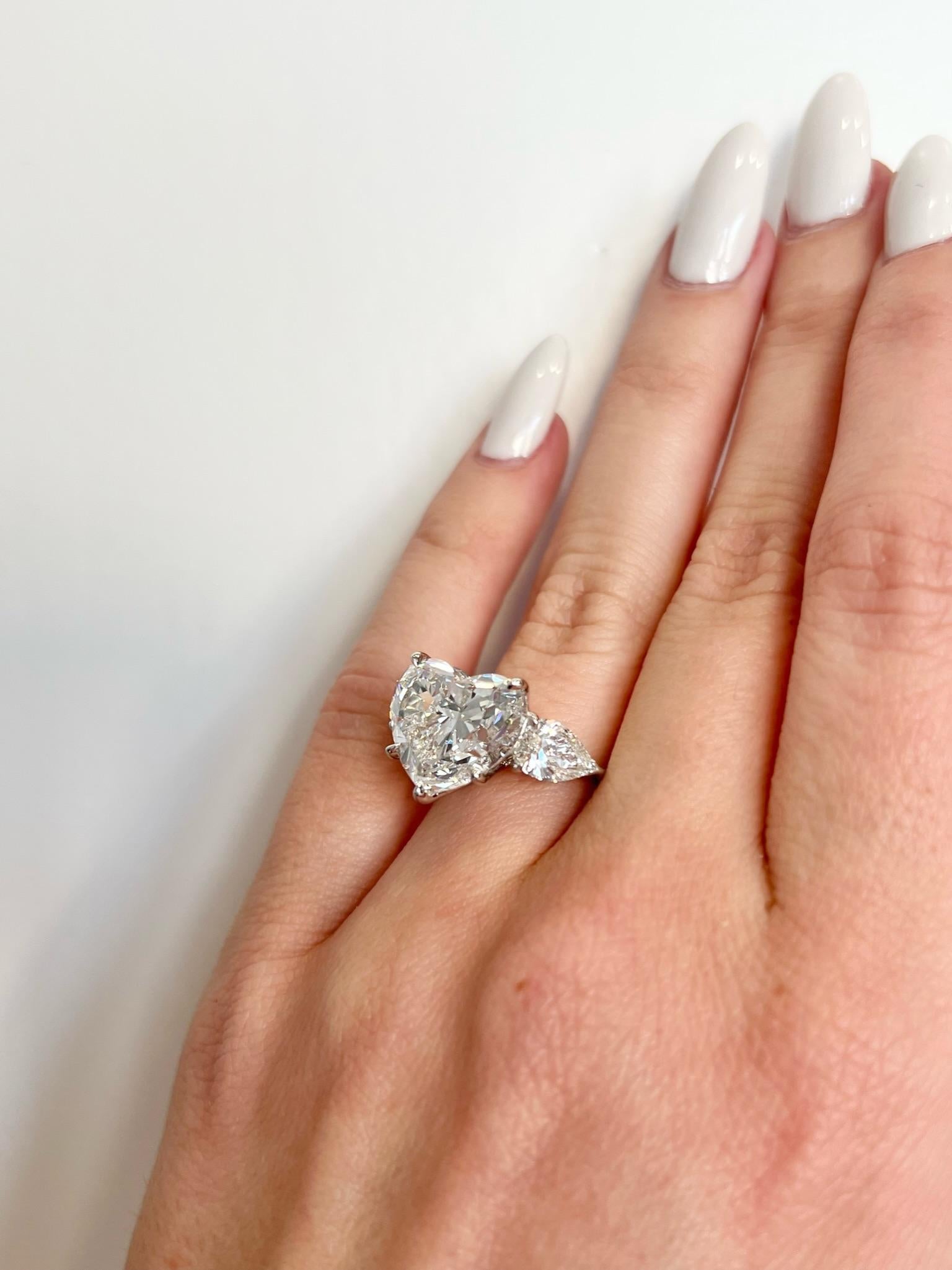 David Rosenberg 7.09 Carat Heart Shape F VS2 GIA 3 Stone Diamond Engagement Ring For Sale 2