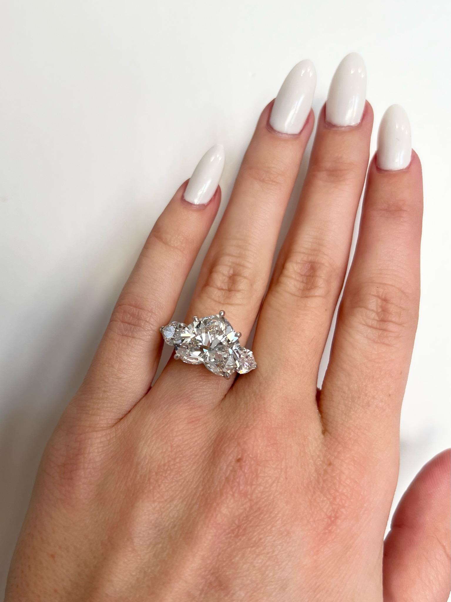 David Rosenberg 7.09 Carat Heart Shape F VS2 GIA 3 Stone Diamond Engagement Ring For Sale 3