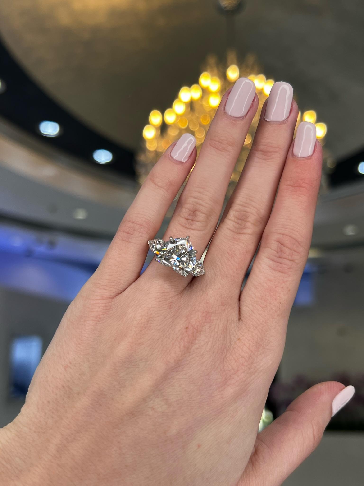 David Rosenberg 7.09 Carat Heart Shape F VS2 GIA 3 Stone Diamond Engagement Ring For Sale 6