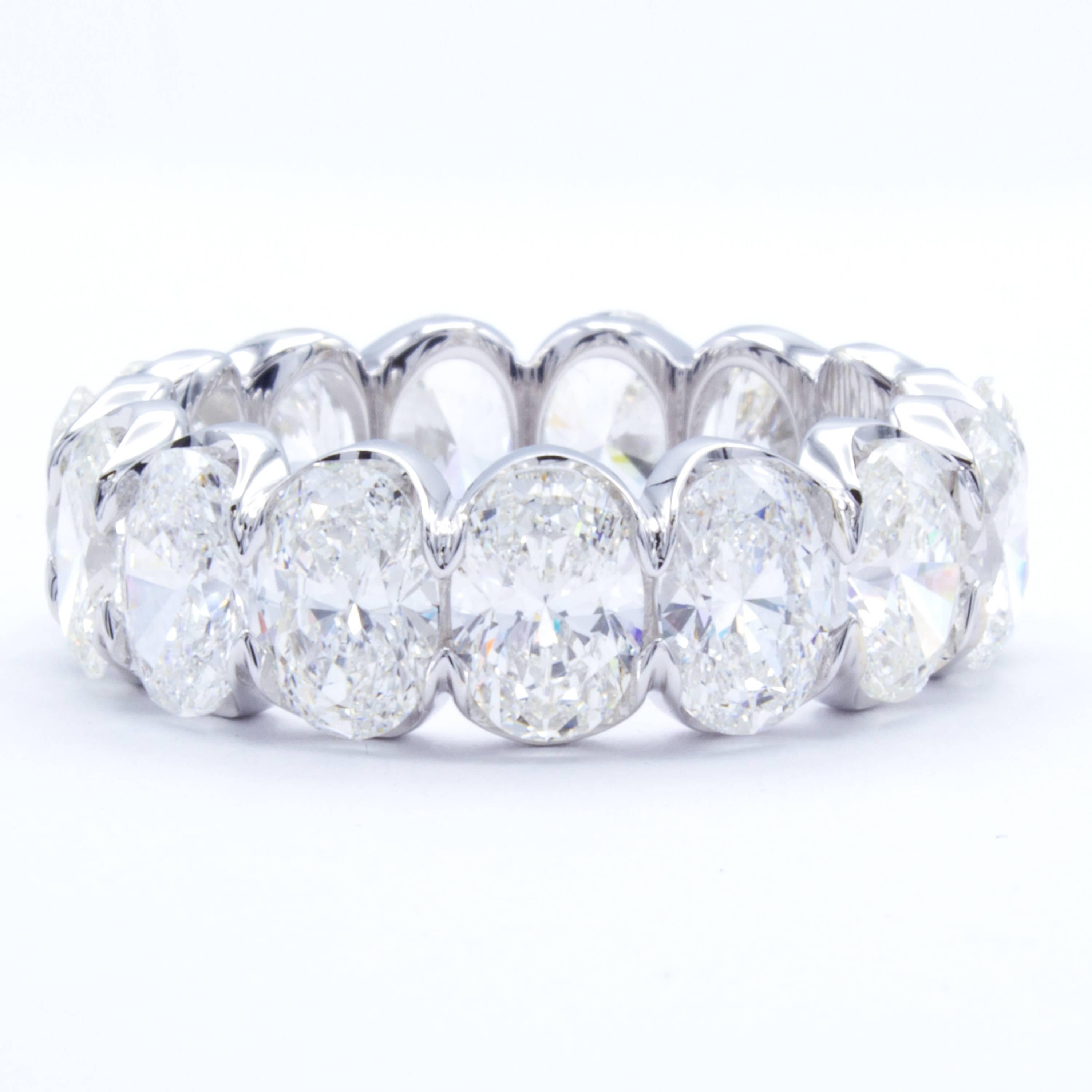 A Rosenberg Diamonds & Co. diamond eternity band displaying the exceptional quality one can only expect from David Rosenberg. A band of bright 18Kt white gold carries 7.40 carats of oval cut diamonds, each perfectly matched to accentuate each others