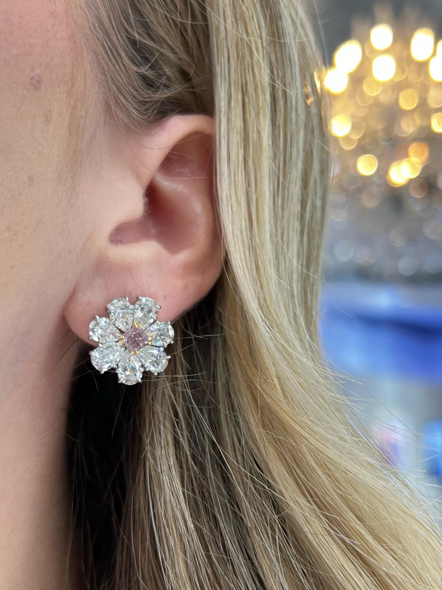 Earrings by David Rosenberg. These Mesmerizing Bubble Gum Color Fancy Purple Pink Radiant Diamond Earrings are surrounded by perfectly matched Collection Color Pear Shapes, 8.21 total weight All diamonds are accompanied by GIA Certification 

David