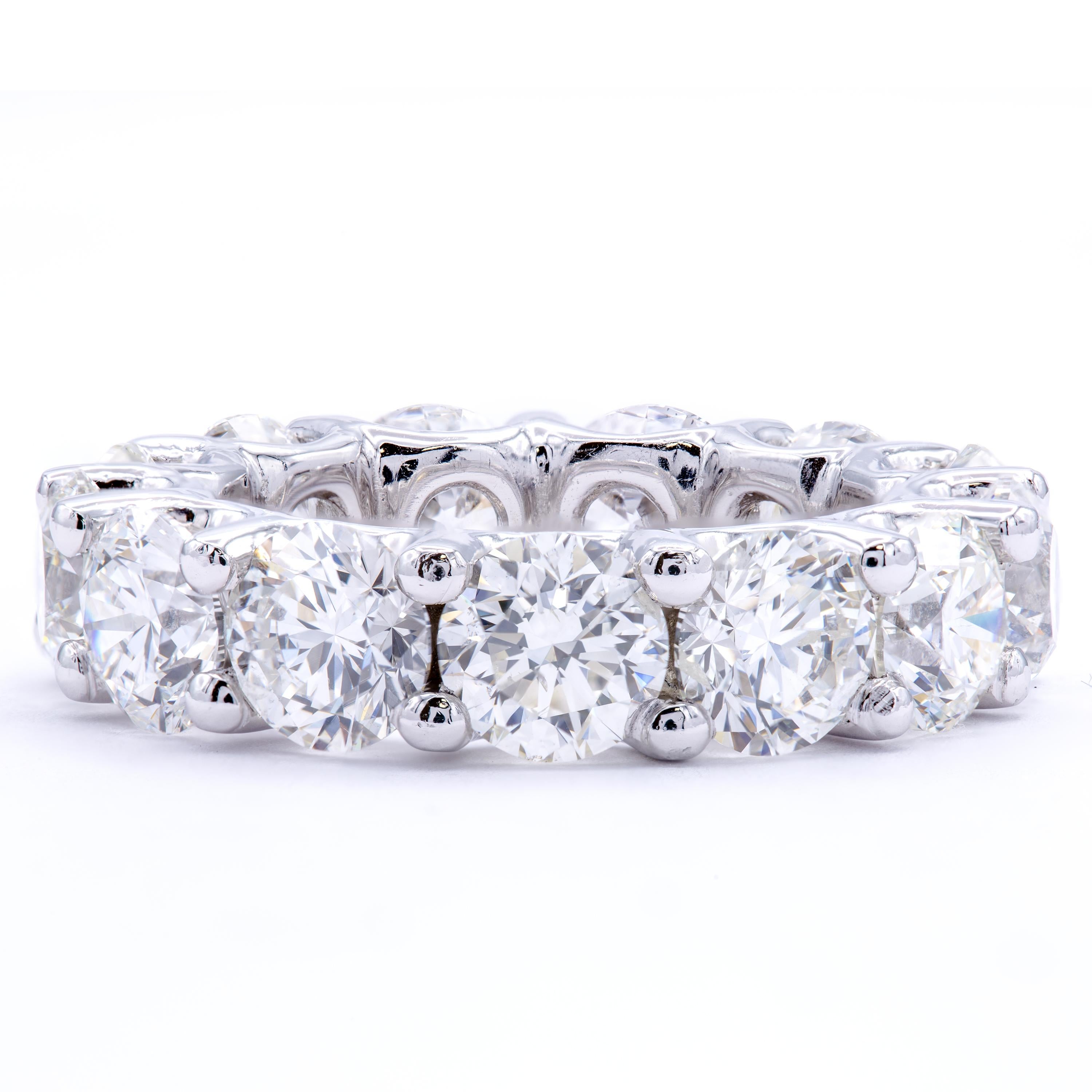 An elegant classic, timeless in its overwhelming beauty made even more so with exceptional diamonds from Rosenberg Diamonds & Co. This diamond eternity band shows a band of bright platinum embracing 9.75 carats of round brilliant diamonds. Each of