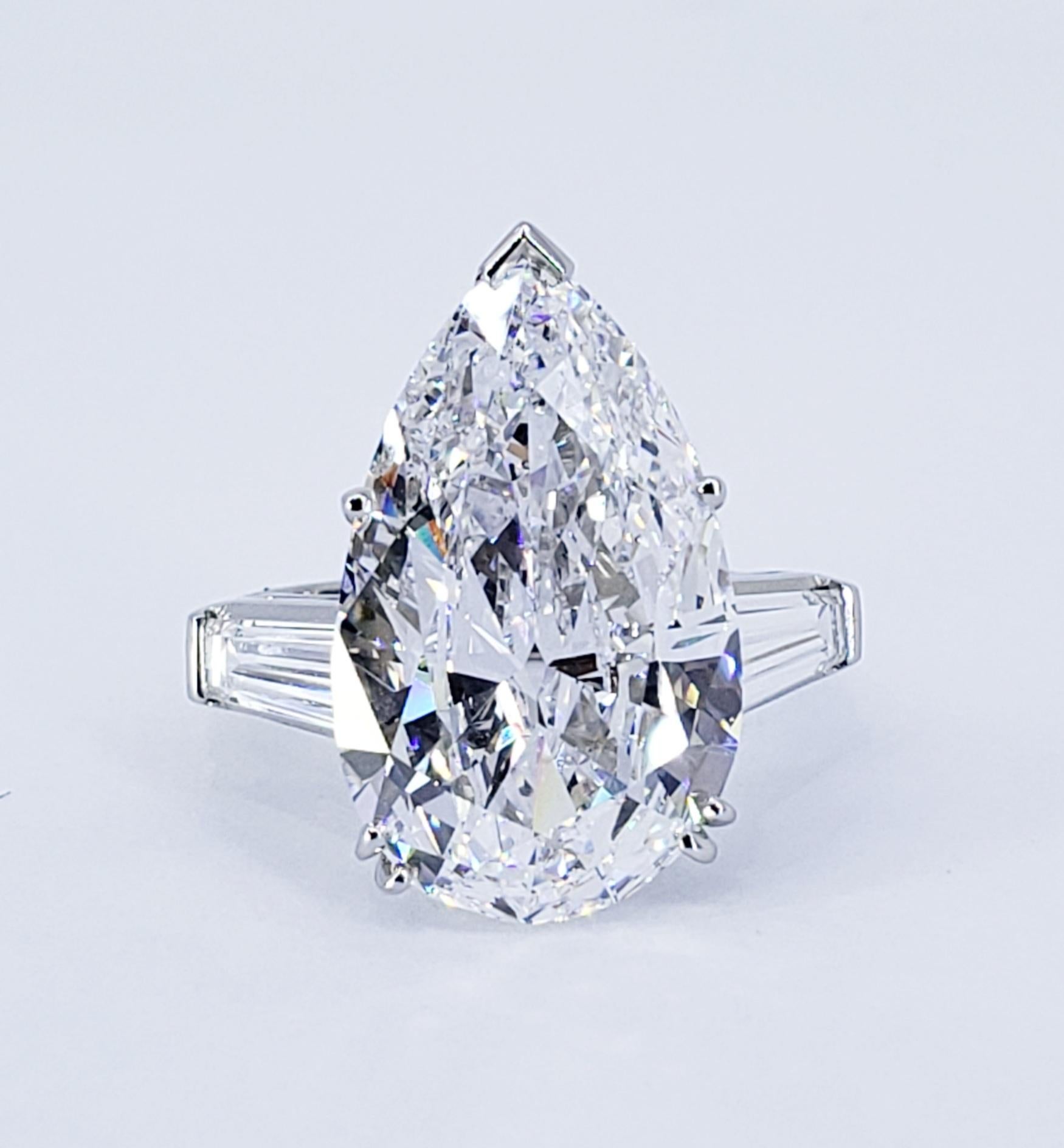 Rosenberg Diamonds & Co. 9.77 carat Pear shape D color VVS2 clarity is accompanied by a GIA certificate. This exquisite collection color pear shape diamond is a classic staple of royal elegance. This pear is set in a handmade platinum setting with