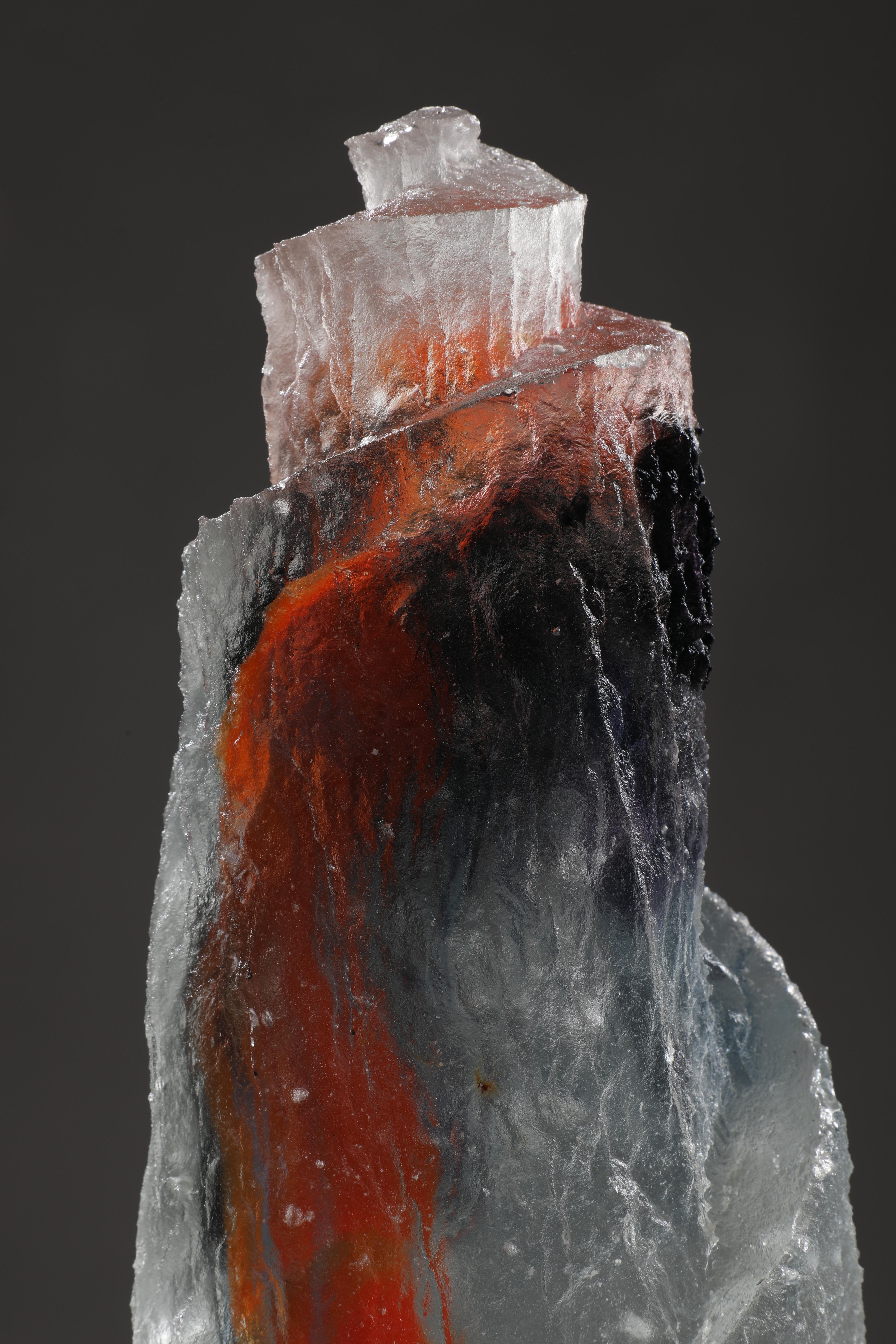 'Al Safi' is a contemporary abstract cast glass sculpture by David Ruth from his Internal Space series.  This part of the series was inspired by astronomy and the distant galaxies and stars. David fused of various colored glass creates a layered,