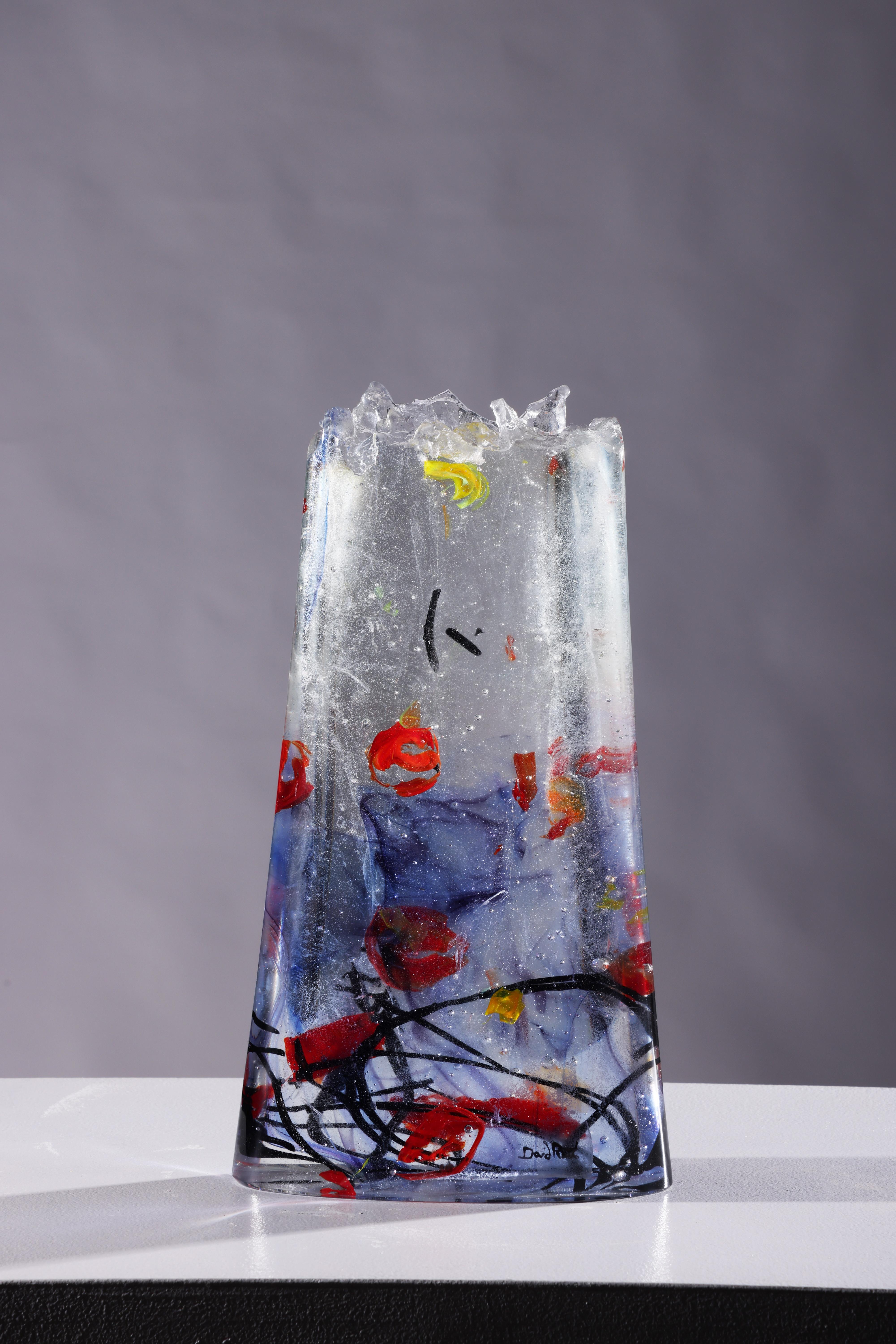 'Kotu' is a contemporary abstract cast glass sculpture by David Ruth from his Internal Space series. David wanted to capture pictorial quality of his previous cast internal pieces, but in a solid standing form. This fusing of various colored glass