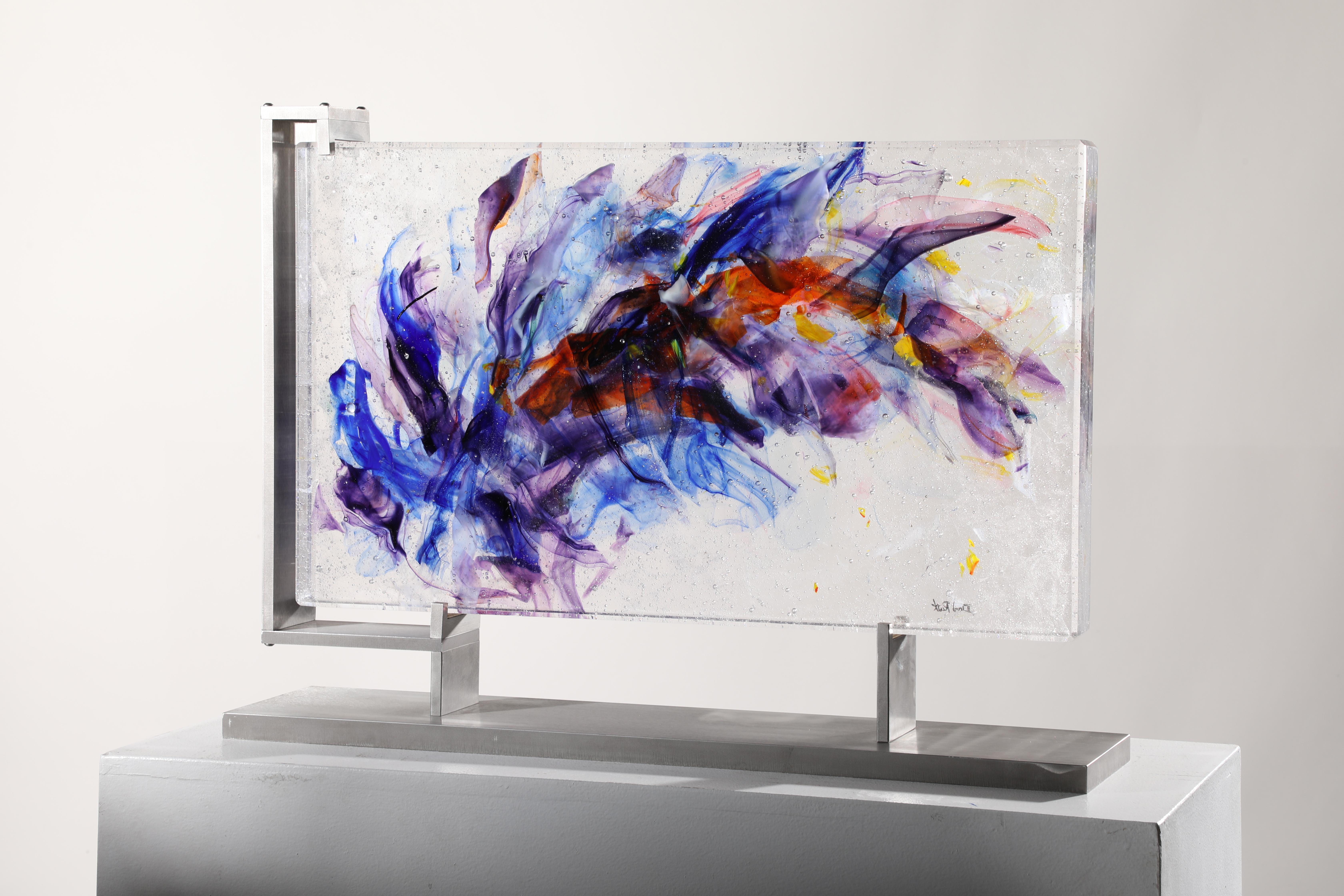 'Mangaia' is a contemporary abstract cast glass sculpture by David Ruth from his Internal Space series. It features painterly brushstroke formations in glass called trails. Trails are created through rolling molten glass into various forms and