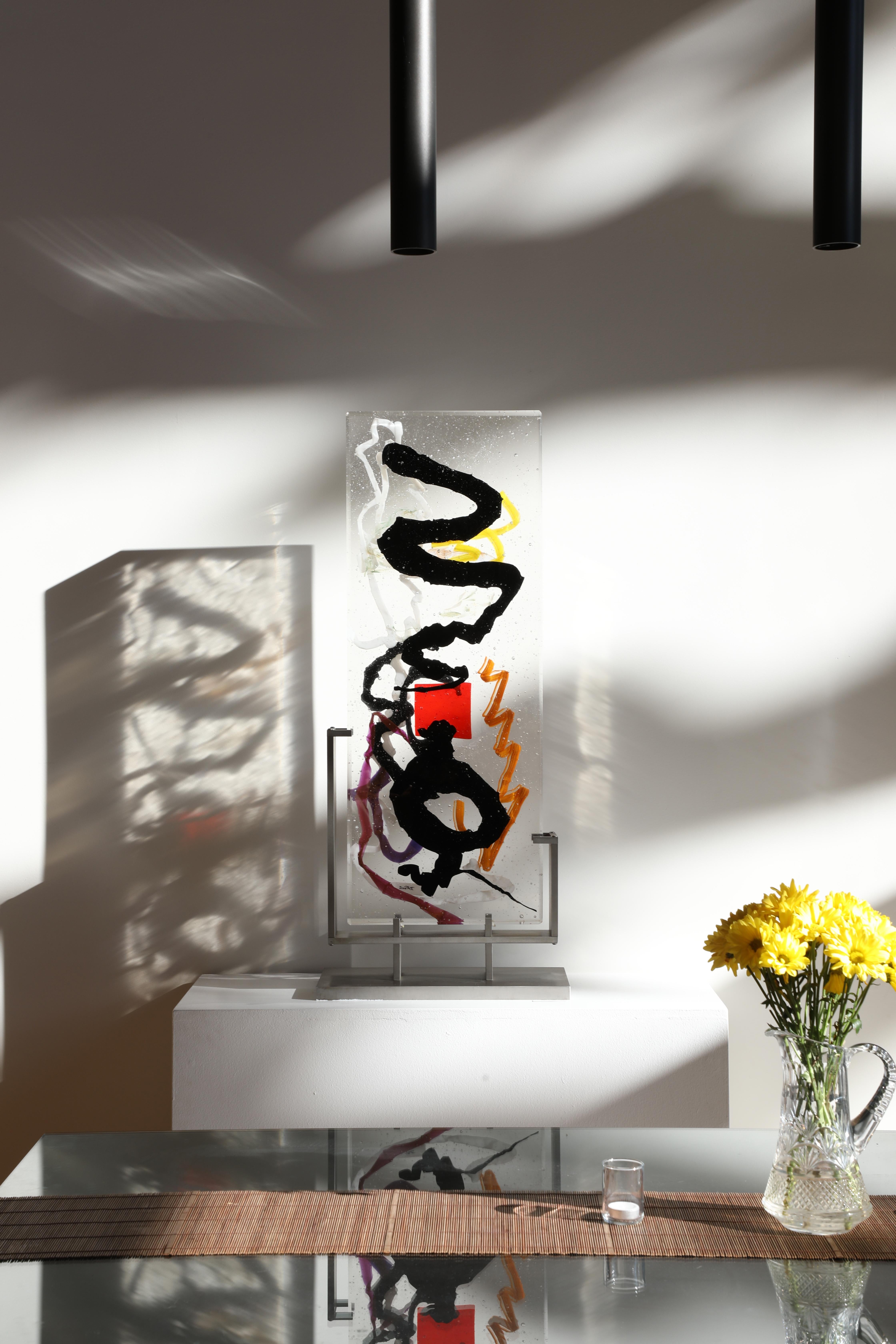 'Rapota' is a contemporary abstract cast glass sculpture by David Ruth from his Internal Space series. It was the last completed sculpture from this series. It features painterly brushstroke formations in glass called trails. These trails are in
