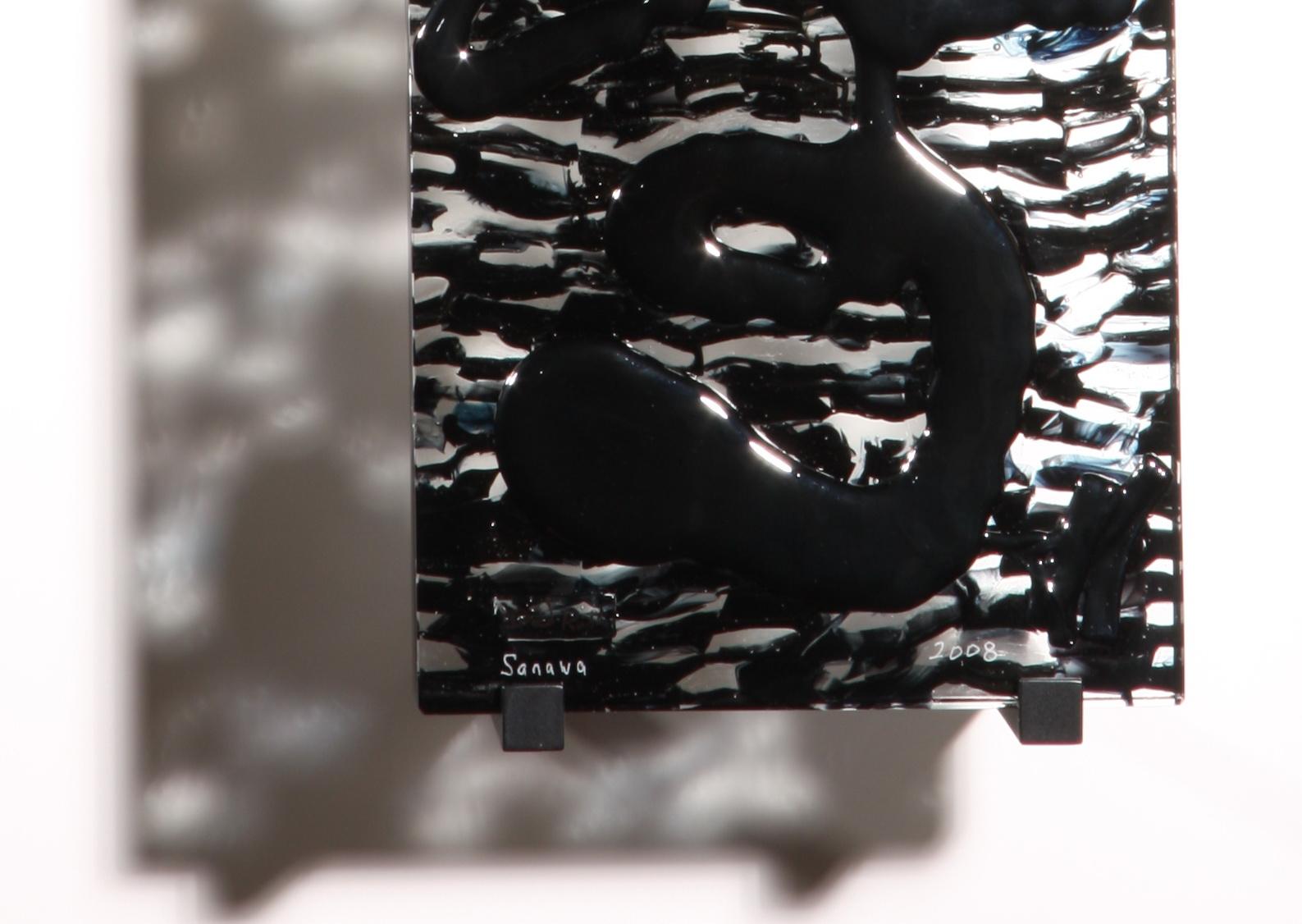'Sanawa' is a contemporary abstract glass by artist David Ruth. Created in 2008, it was a piece in a series about the David's views on the American invasion of Iraq. 

