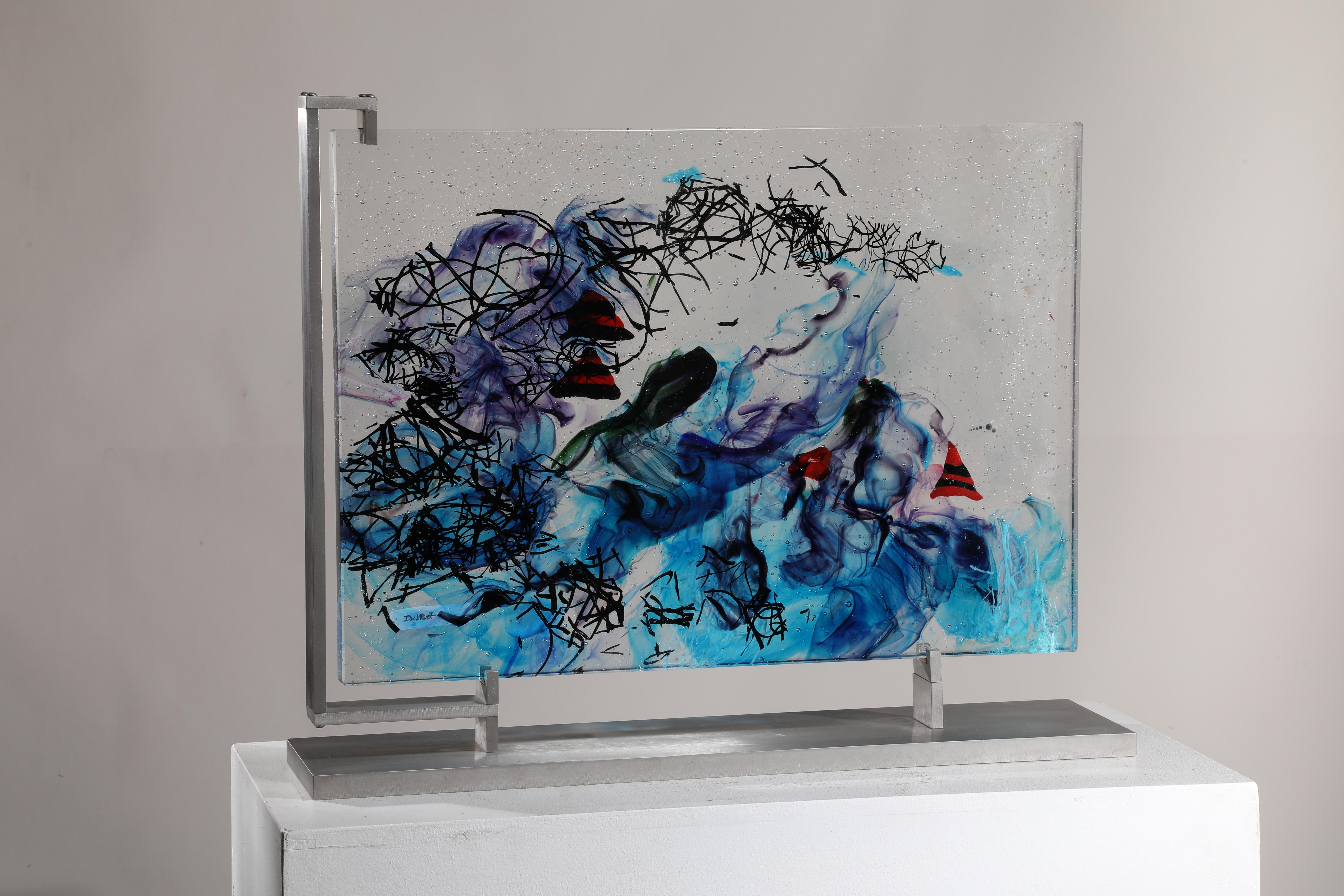 'Tikei' is a contemporary abstract cast glass sculpture by David Ruth from his Internal Space series. It features painterly brushstroke formations in glass called trails. Trails are created through rolling molten glass into various forms and shapes.