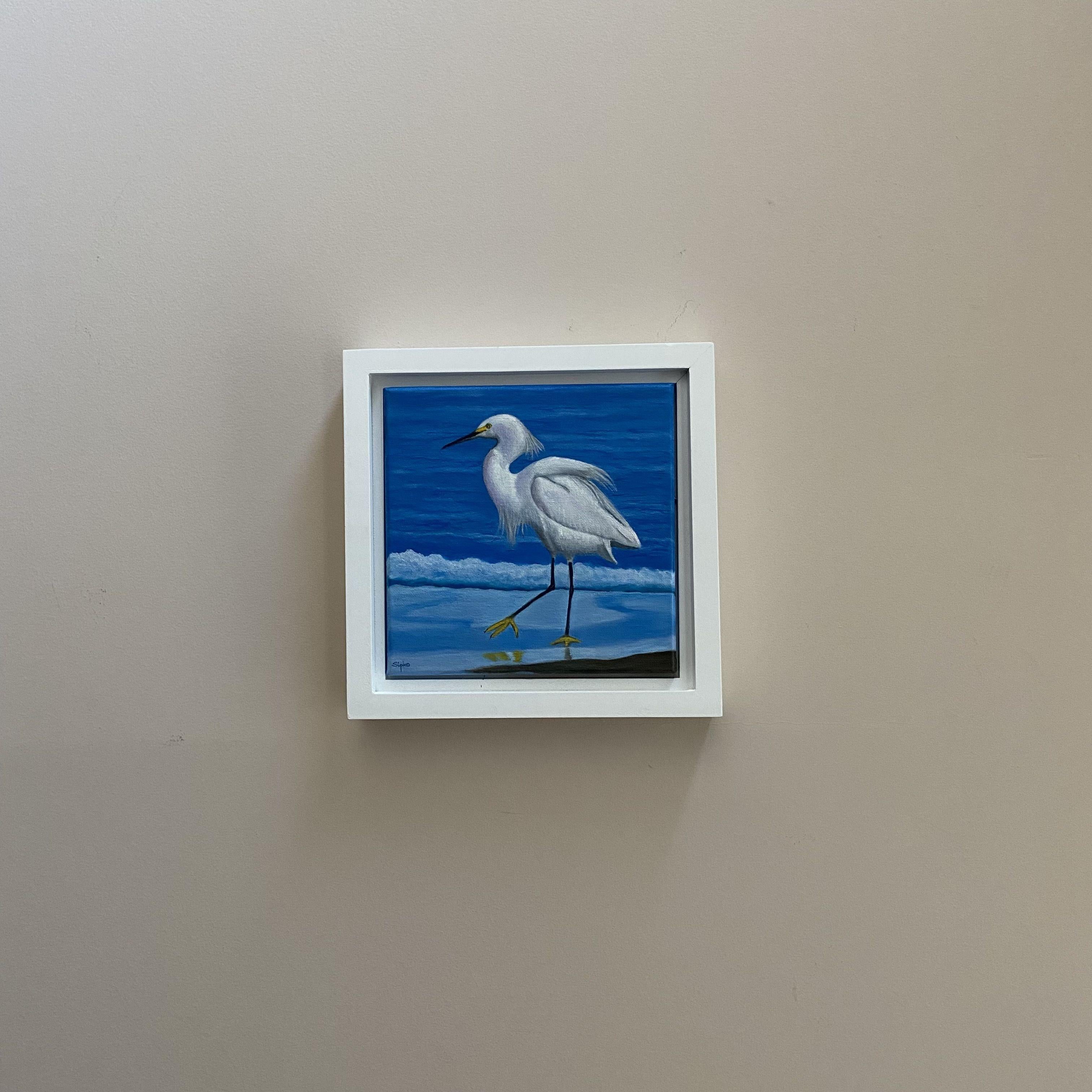 I live in an area that has many Egrets visiting in the summer.  This is a snowy egret walking the shoreline for a meal.  They are a performance art all to their own.  This piece is framed in a solid wood floater frame and is varnished and ready to