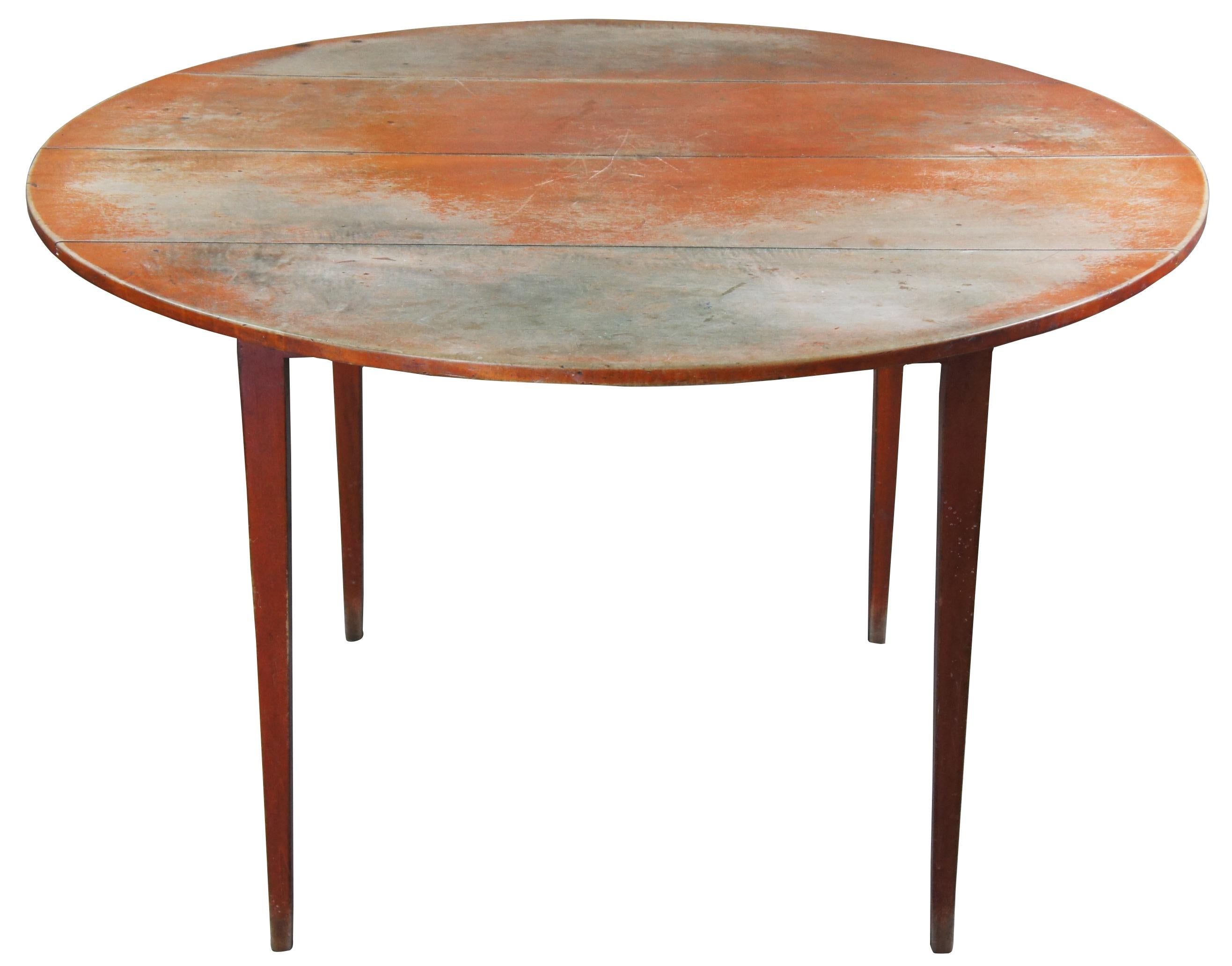 David T Smith shaker style American pine painted breakfast table, circa 1980s. Features a round planked top over square tapered legs. David T Smith out of Morrow Ohio, is world renowned for 18th and 19th century American reproduction furniture.