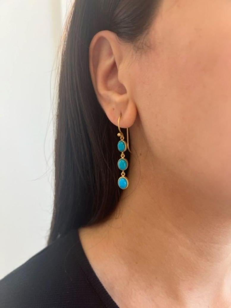 These 22K Gold Free Form Turquoise Drop Earrings are handcrafted by David Tishbi in Pacific Palisades CA

22K Gold Wrapped Triple Free Form Turquoise Drop Earrings

Arizona Sleeping Beauty Turquoise 6 CTW

French Wire Hook 

David Tishbi