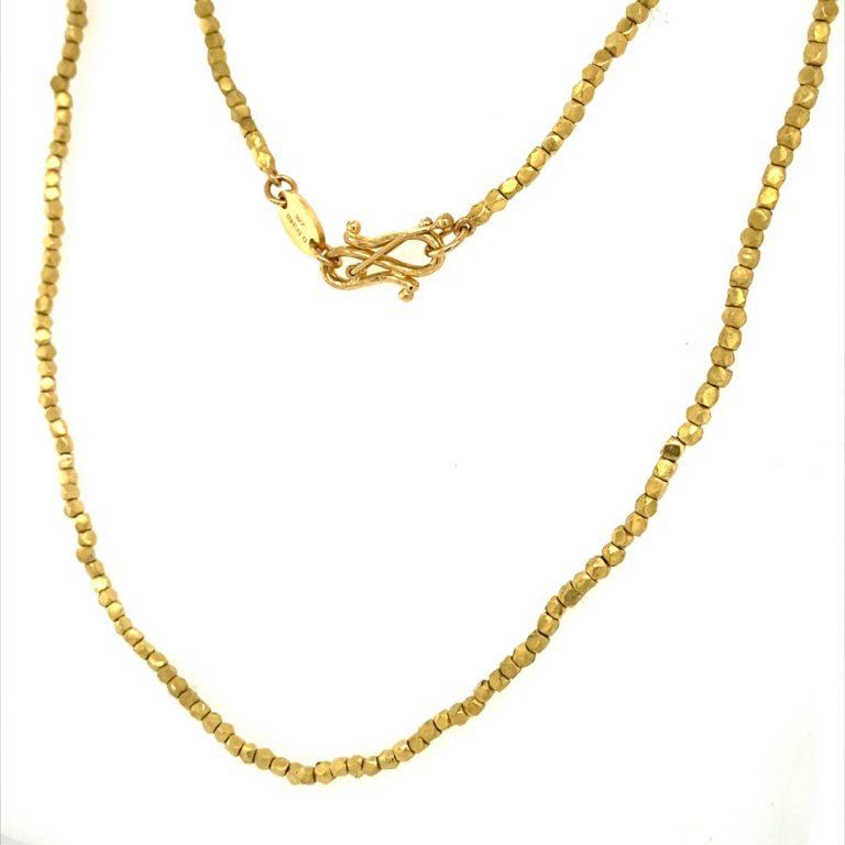 This 22 Karat Gold Nugget Bead Necklace is handcrafted by David Tishbi in the Pacific Palisades.  Each bead nugget is handmade. This necklace is 17