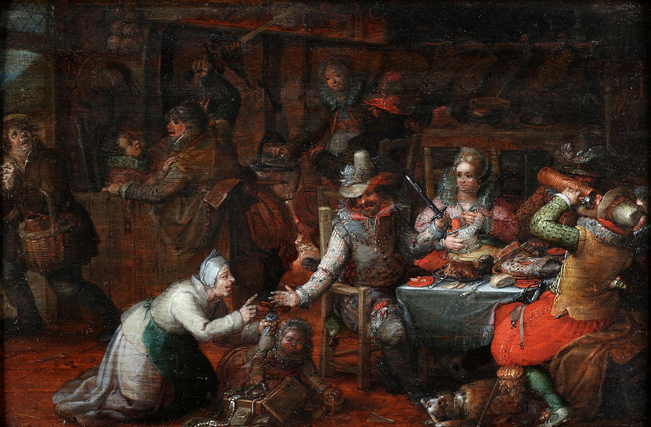 Oil on panel 

Around 1620.

A family of well dressed townspeople indulge in food and beverages in a tavern. 
In the left corner, a poor man carrying a basket is being sent away by force. The lower part of the painting comprises of a woman begging