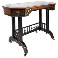 David Waddington. An Aesthetic Movement ebonized and parcel gilt writing desk