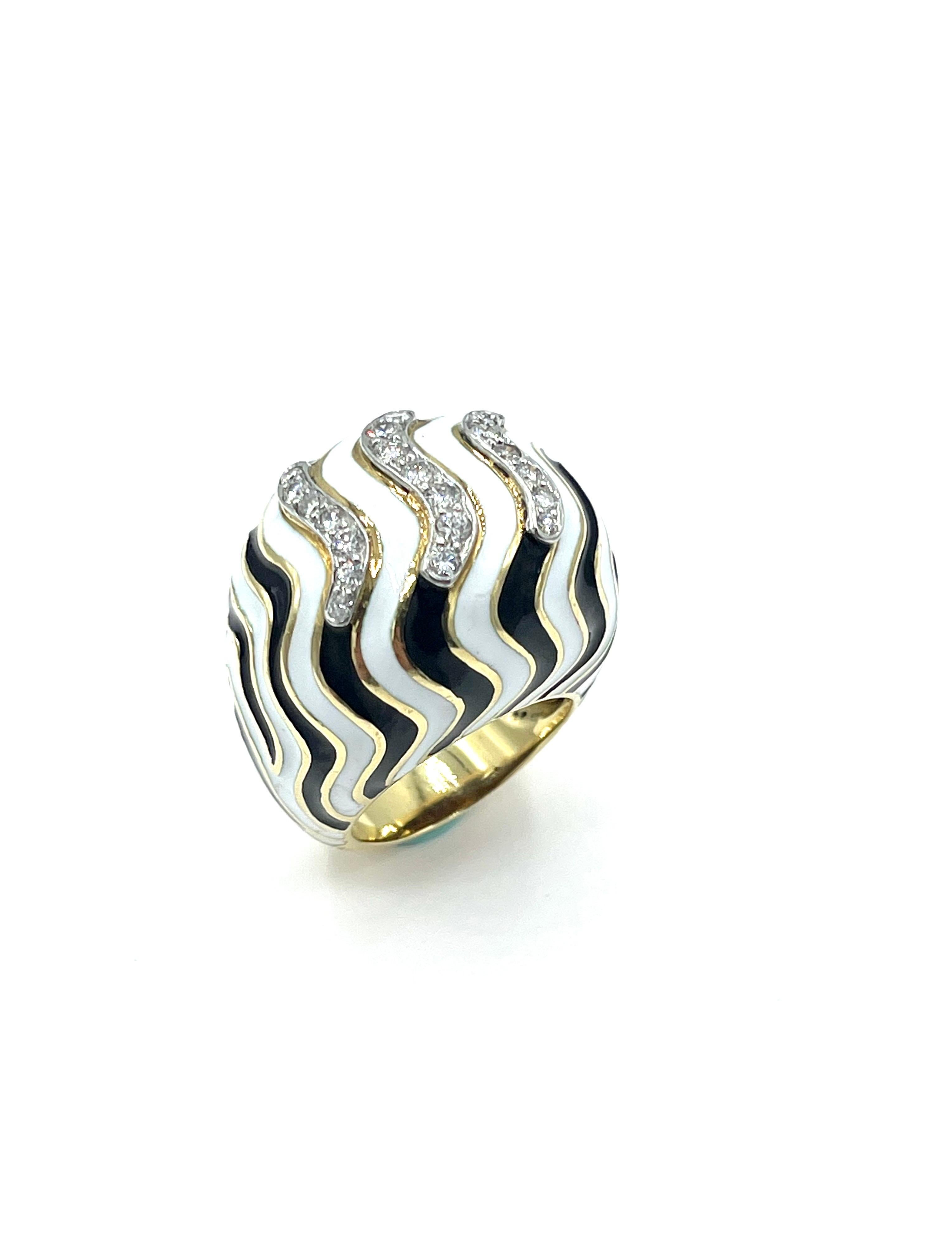 An iconic design by David Webb!  This ring features 21 round brilliant Diamonds set in three curved rows, totaling .50 carats.  They are set on top of the ring surrounded by beautiful black and white enamel, over 18k yellow gold.  The Diamonds are
