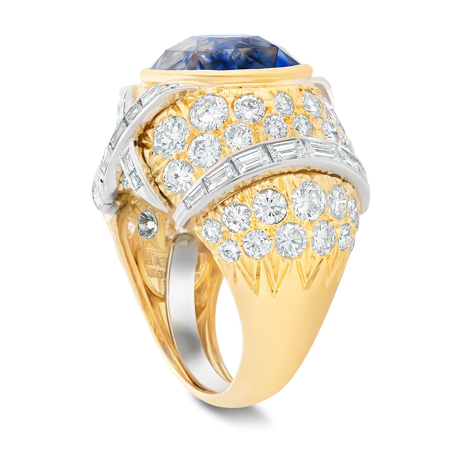 David Webb Ceylon sapphire and diamond dome ring in 18k yellow gold and platinum, accompanied by a David Webb Certificate of Authenticity.

The centerpiece of this ring is a beautiful bezel set 16.62 carat oval Ceylon sapphire, it is surrounded by