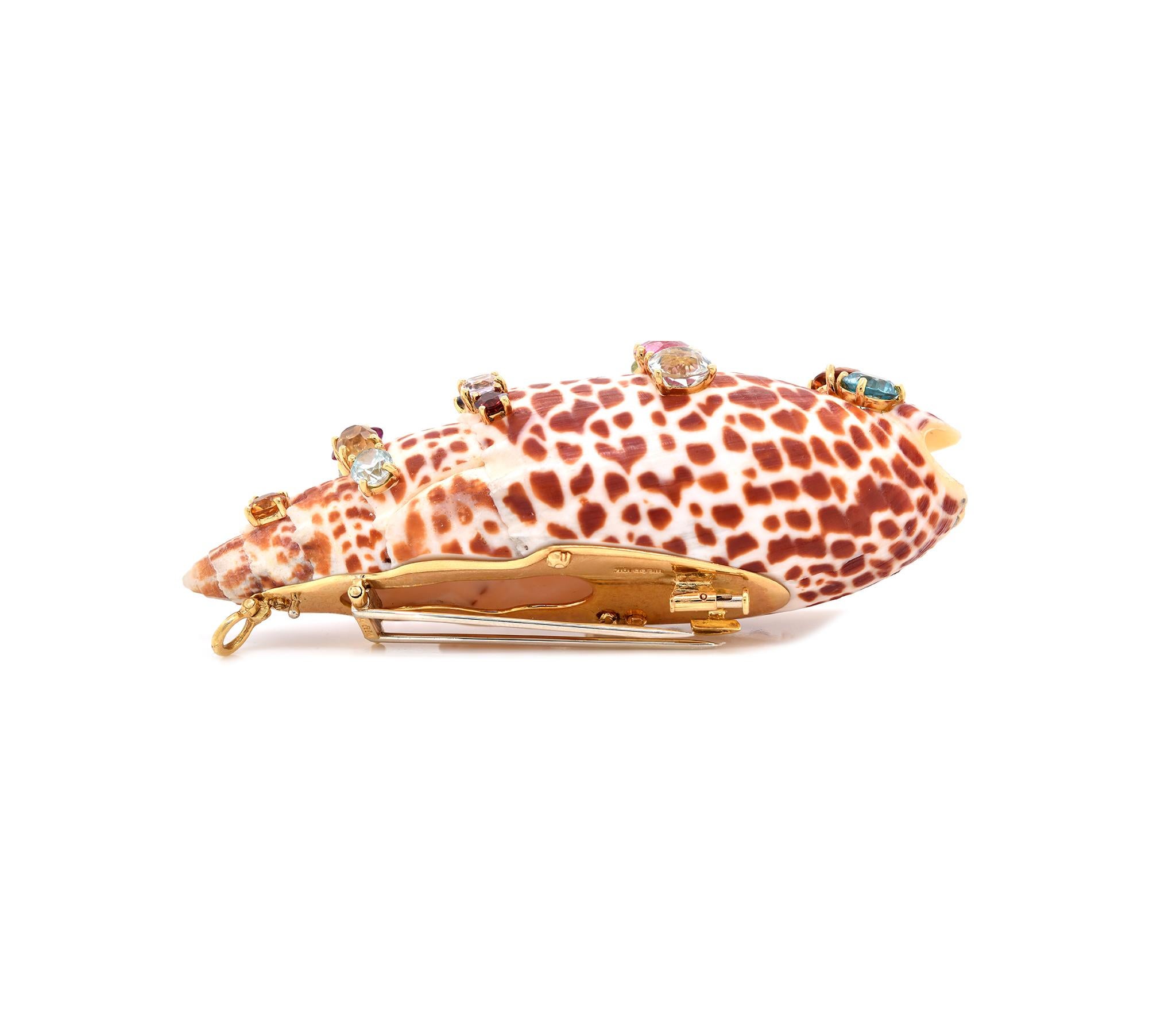 Designer: David Webb
Material: 18K yellow gold / Conch shell
Weight: 79.53 grams
Measurement: shell measures 95 X 37mm
