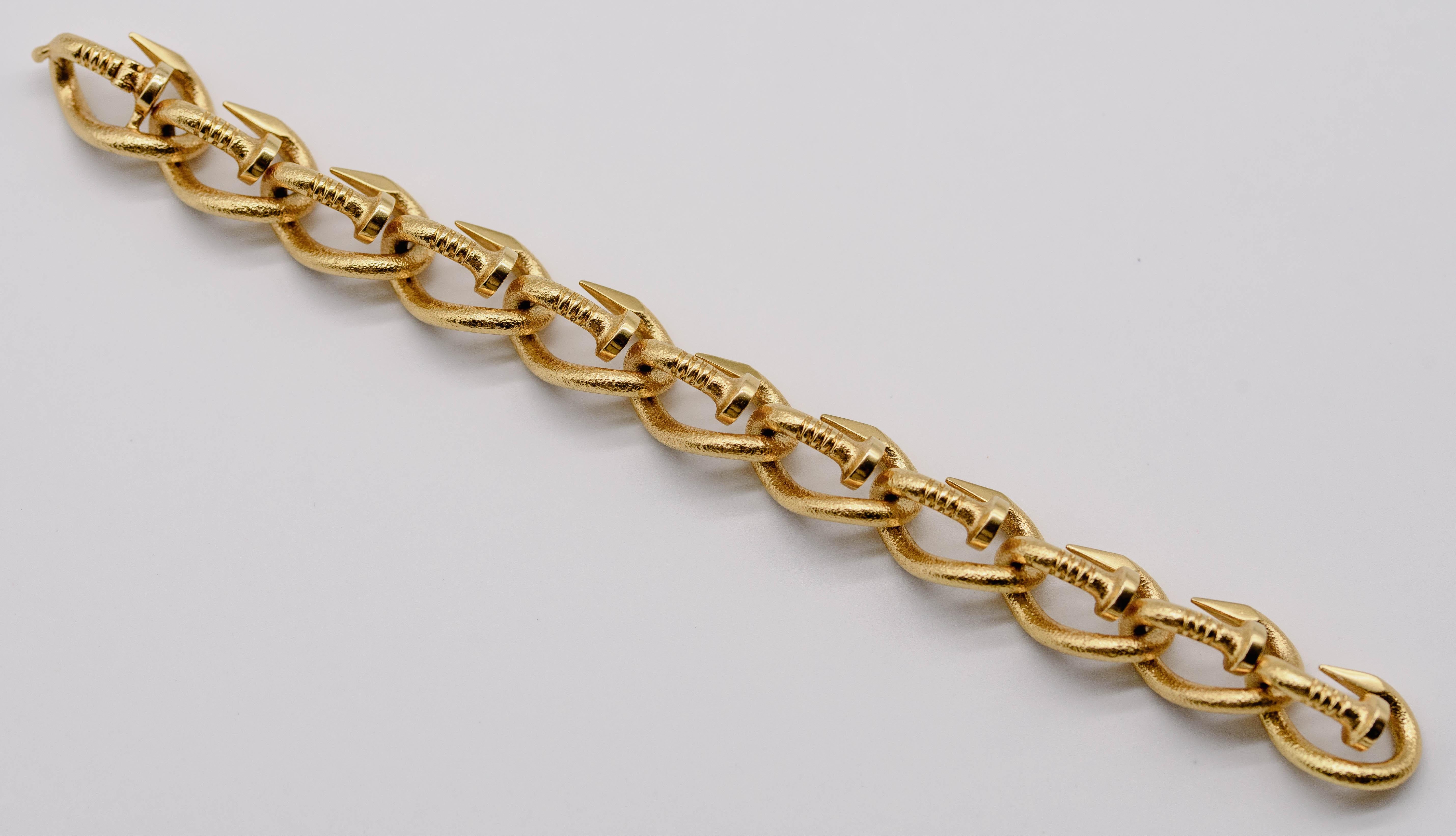 A timeless classic from a timeless maker, this gorgeous jewel can be worn anywhere, anytime.  7 1/4 inches in length, crafted in warm and rich 18 karat yellow gold; hefting it in the palm of your hand  makes you feel the density of the metal.   Upon