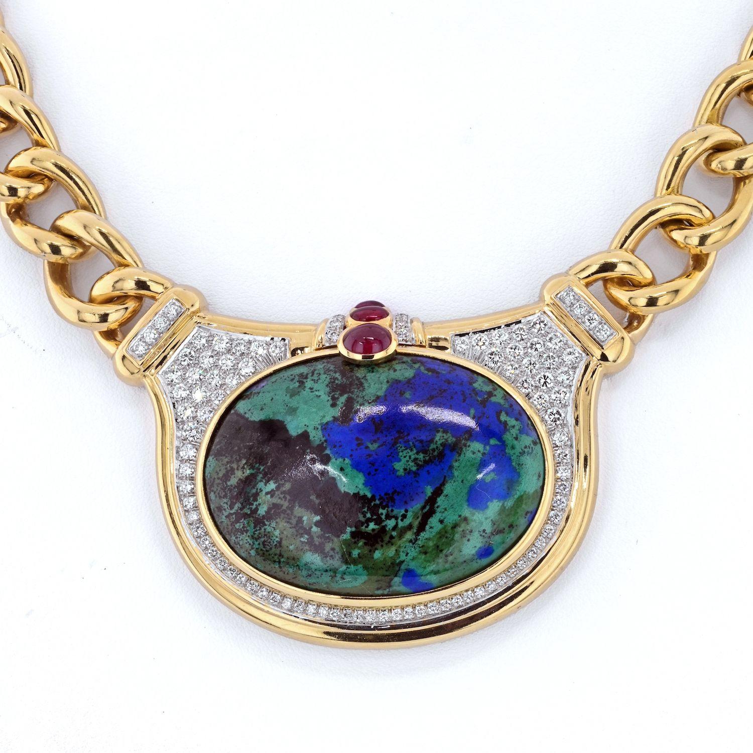 This fabulous necklace is an 18 karat yellow gold, diamond and azurmalachite necklace designed and signed by David Webb. The necklace centers a large smooth oval tablet of high quality azurmalachite further surrounded by approximately 4 cts in round