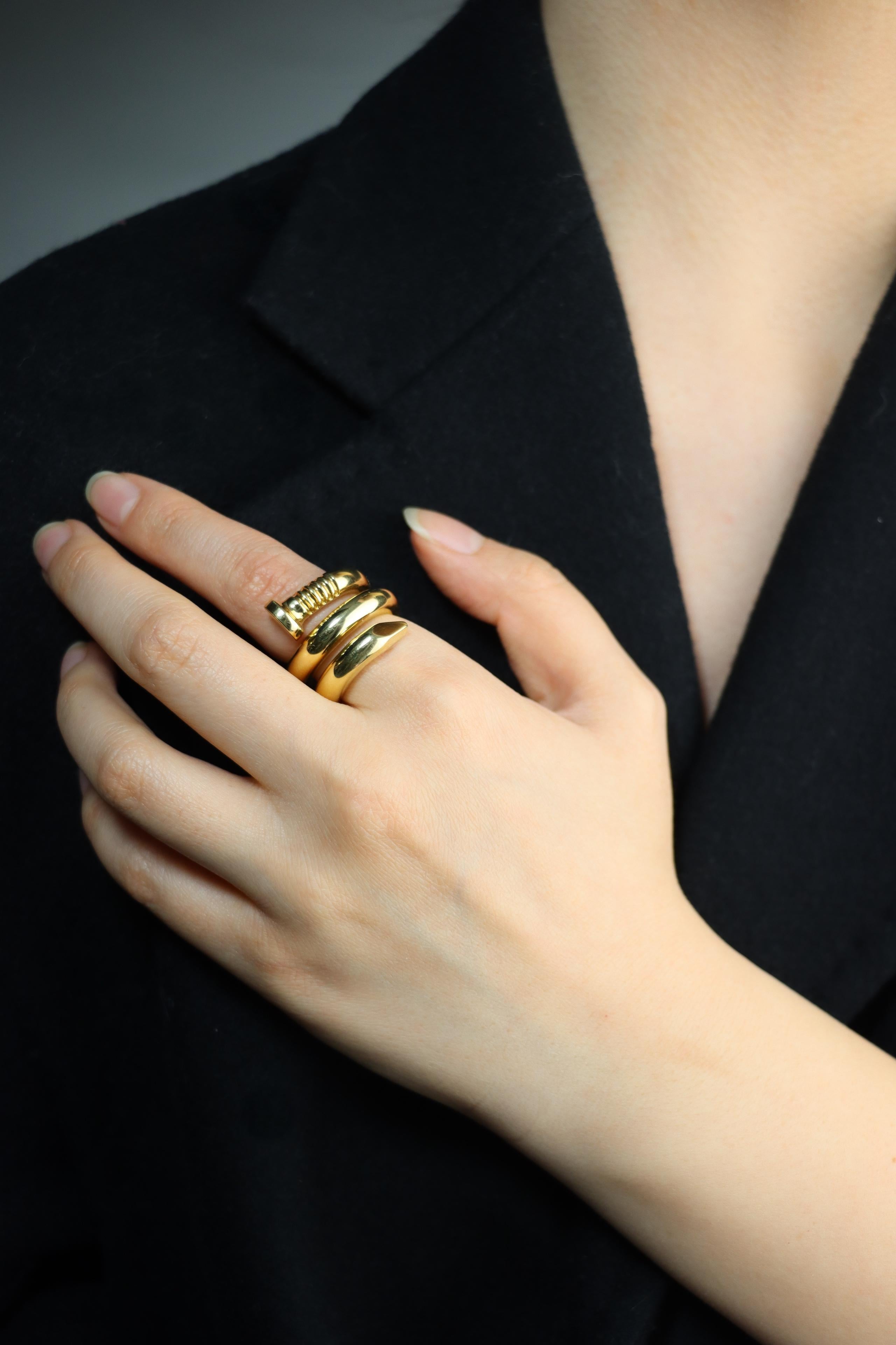 David Webb 18K Gold Nail Ring 

Marked:
David Webb
18K

Approximate Dimensions:
7 (Ring Size) 
2 (Width)
16.3 grams in weight.