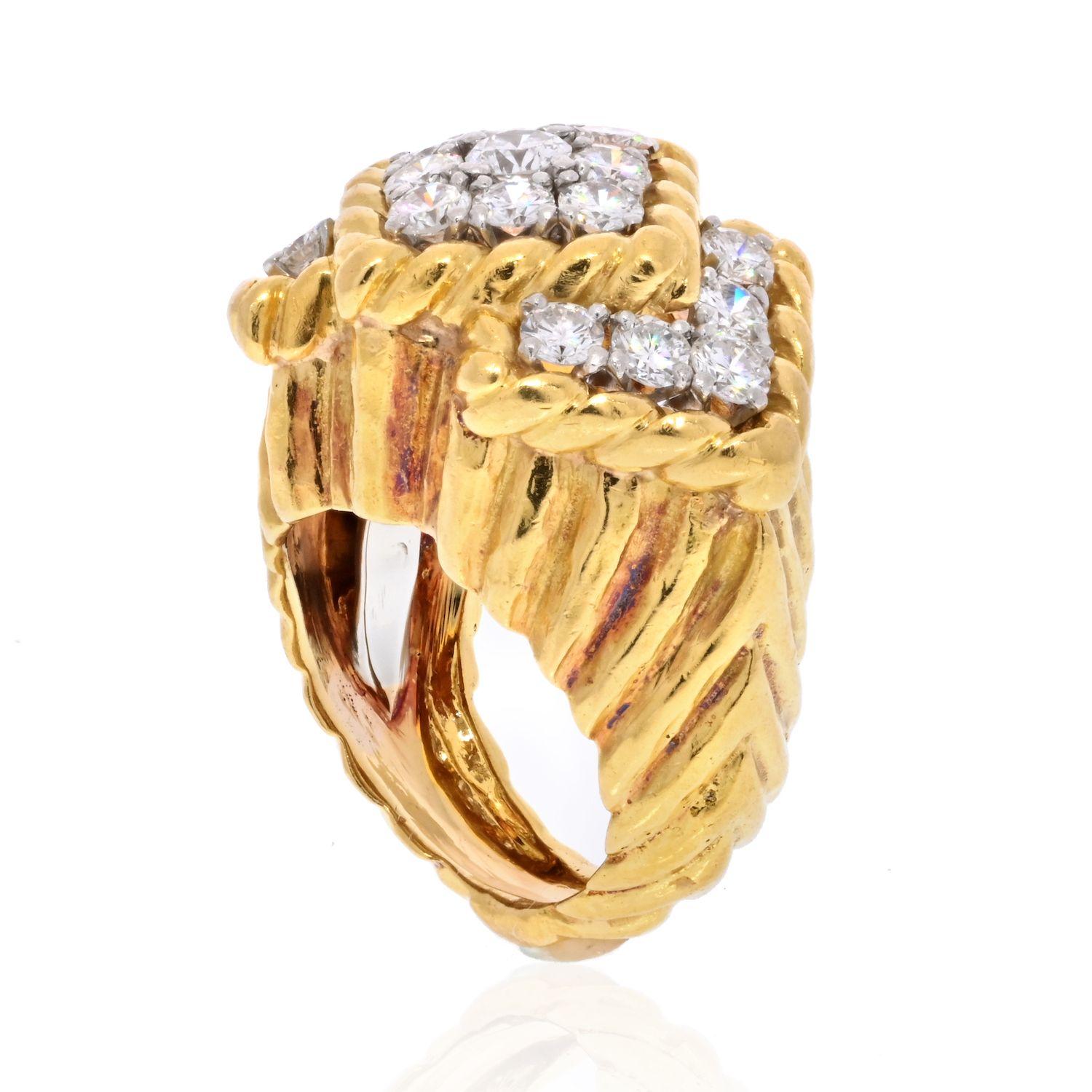 Designed as an interlocking rhombus frame this is a ring designed by David Webb mounted with round diamonds in platinum. Familiar chevron style ring crafted will become your favorite in you jewelry box the moment you put it on, comfortable and