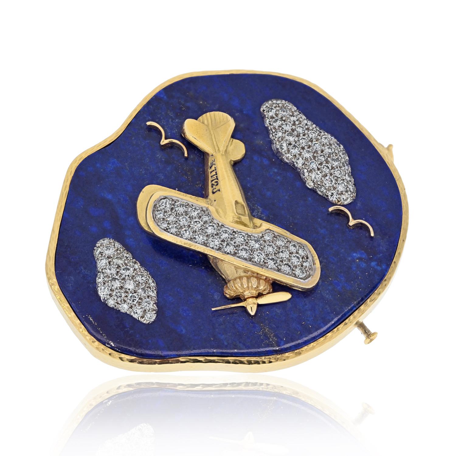 Prepare to be mesmerized by the exquisite craftsmanship and artistic flair of this David Webb brooch. Handcrafted in 18k yellow gold and platinum, this brooch is a true testament to the iconic style and innovation for which David Webb is