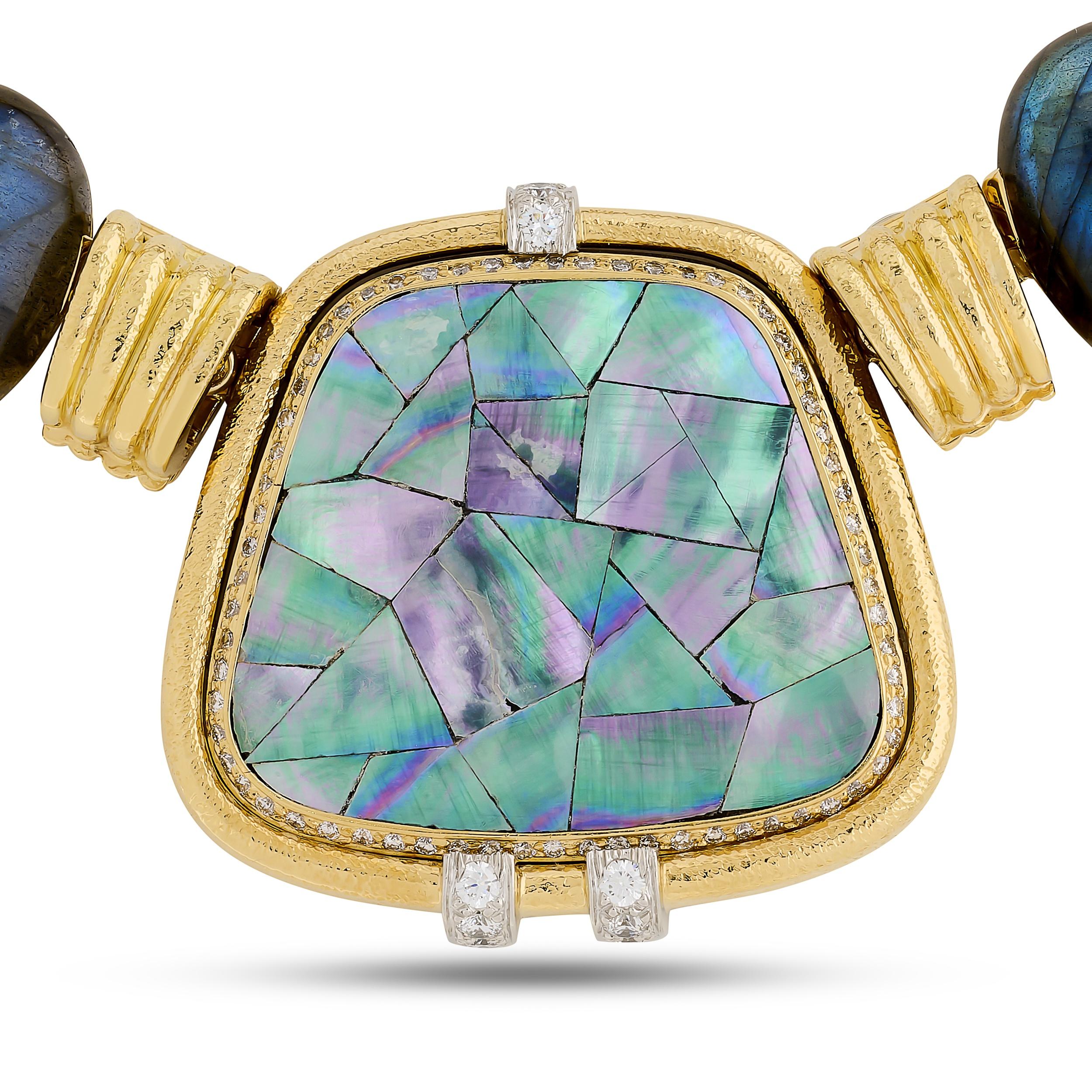 This captivating David Webb necklace features a striking combination of polished oval labradorite beads and three prominent cushion-shaped pendants, each inlaid with iridescent mosaic mother-of-pearl and accented by small diamonds, all set in richly