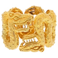 David Webb 18K Yellow Gold Aztec Cuff Double Dragon Head Bracelet