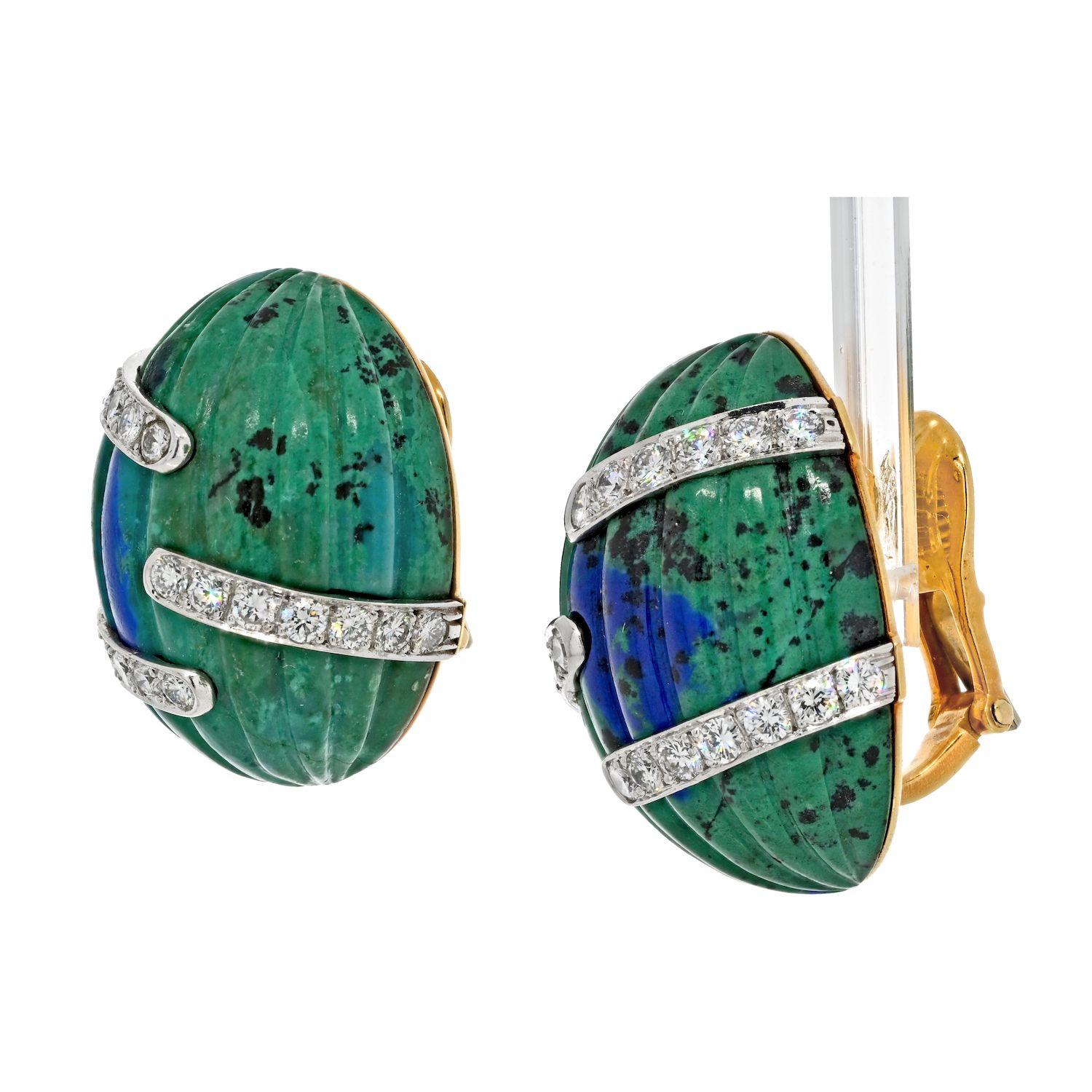 Lovely egg shaped David Webb Platinum & 18K Yellow Gold Azurmalachite And Diamond Bombe Fluted Clip Earrings.
Signed 'Webb, 18k'; containing 40 full cut diamonds [F-G/VS] weighing approximately 2.00 carats total 45.9 grams approximately 36.00 mm