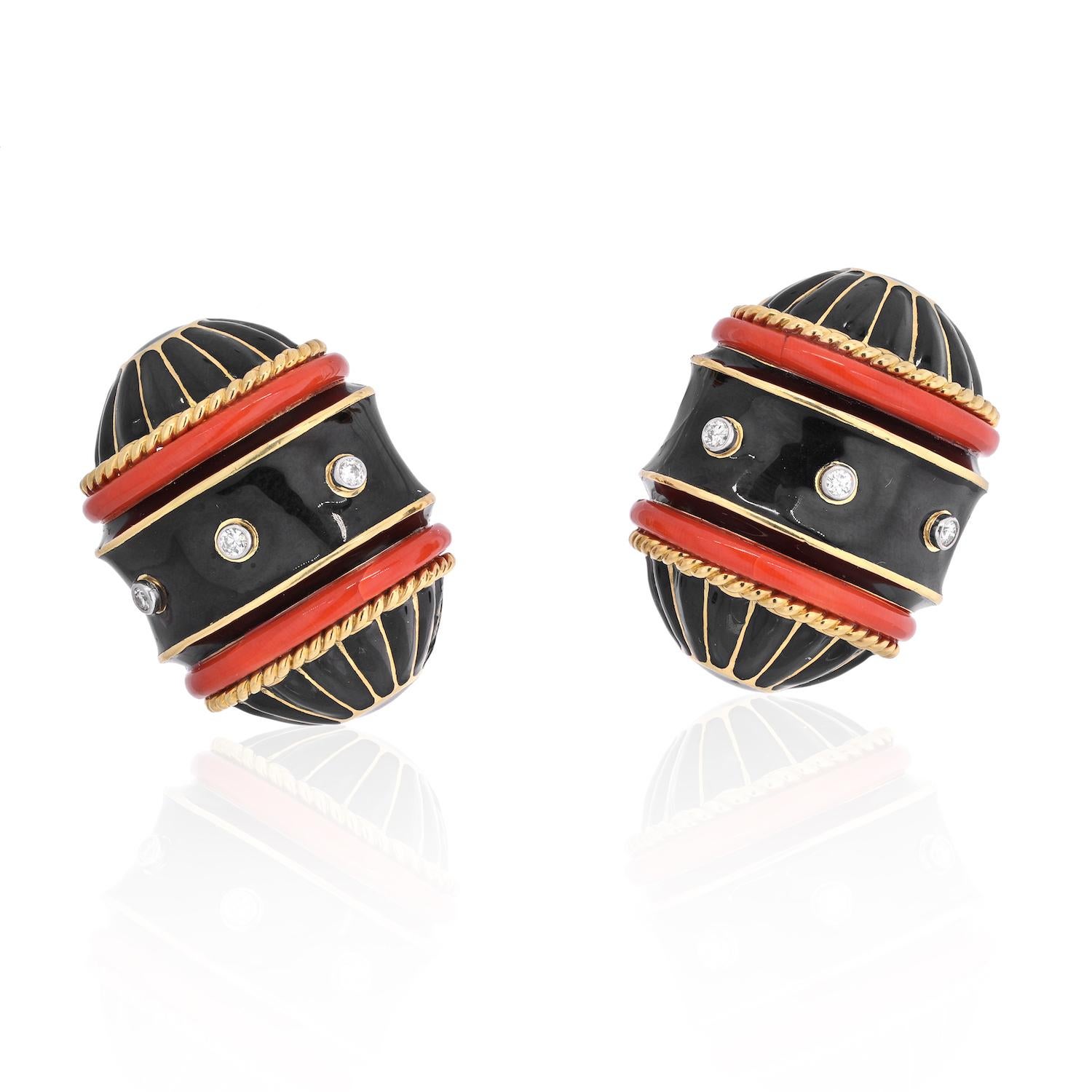 David Webb Stud Collection.
These are barrel-like shaped earrings mounted with carved coral, collet-set diamonds, black enamel, 18K gold, and platinum.
0.75 inches long. 
Clip-on closure for non pierced ears.