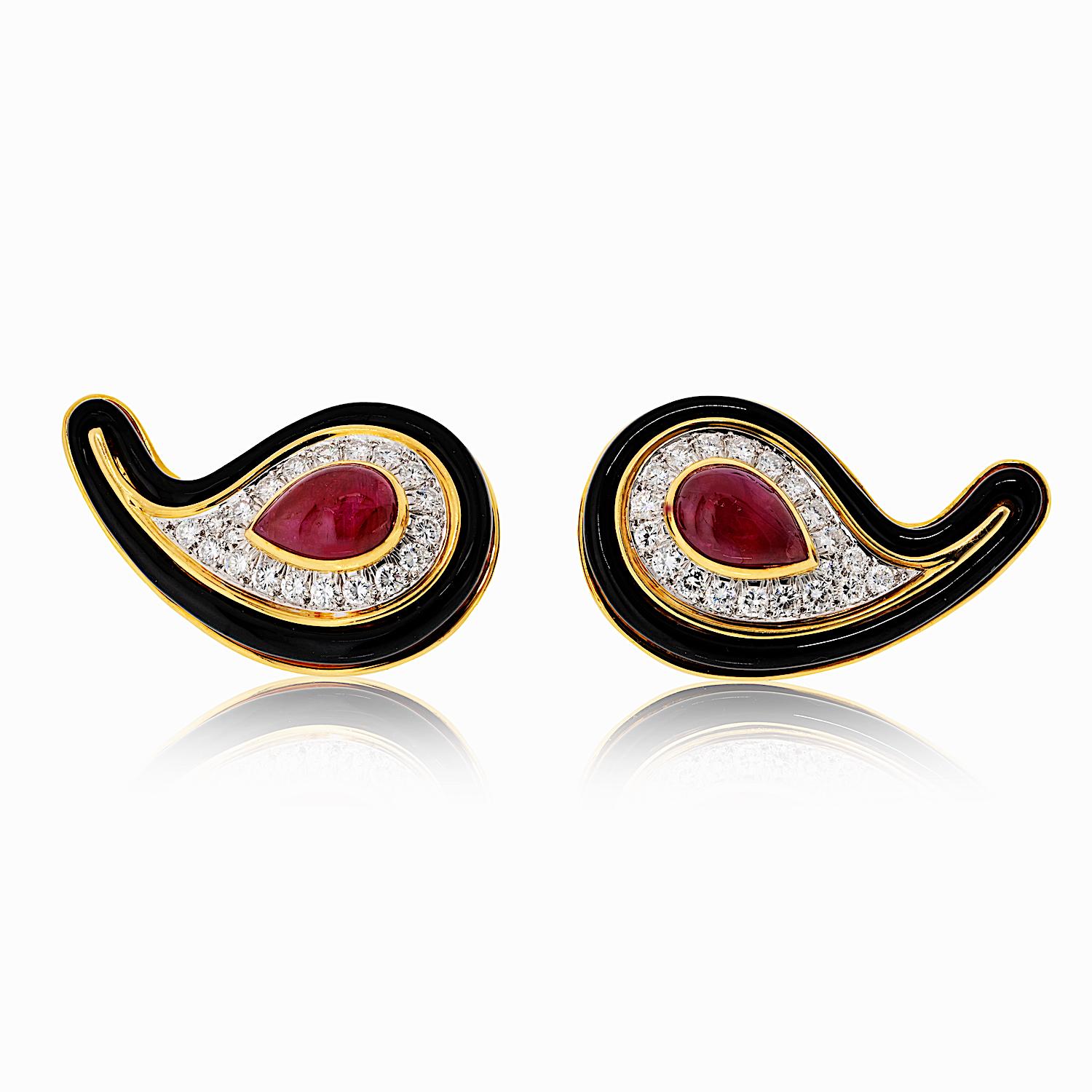 These vintage David Webb earrings are a striking example of bold design and expert craftsmanship. Crafted in 18K yellow gold, they feature an elegant paisley-shaped silhouette with a rich black enamel finish. A row of brilliant round-cut diamonds