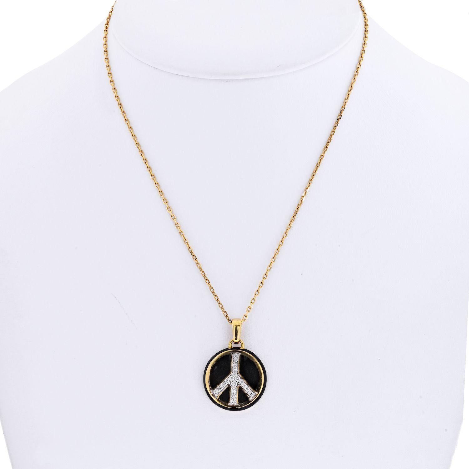 gold peace sign pendant