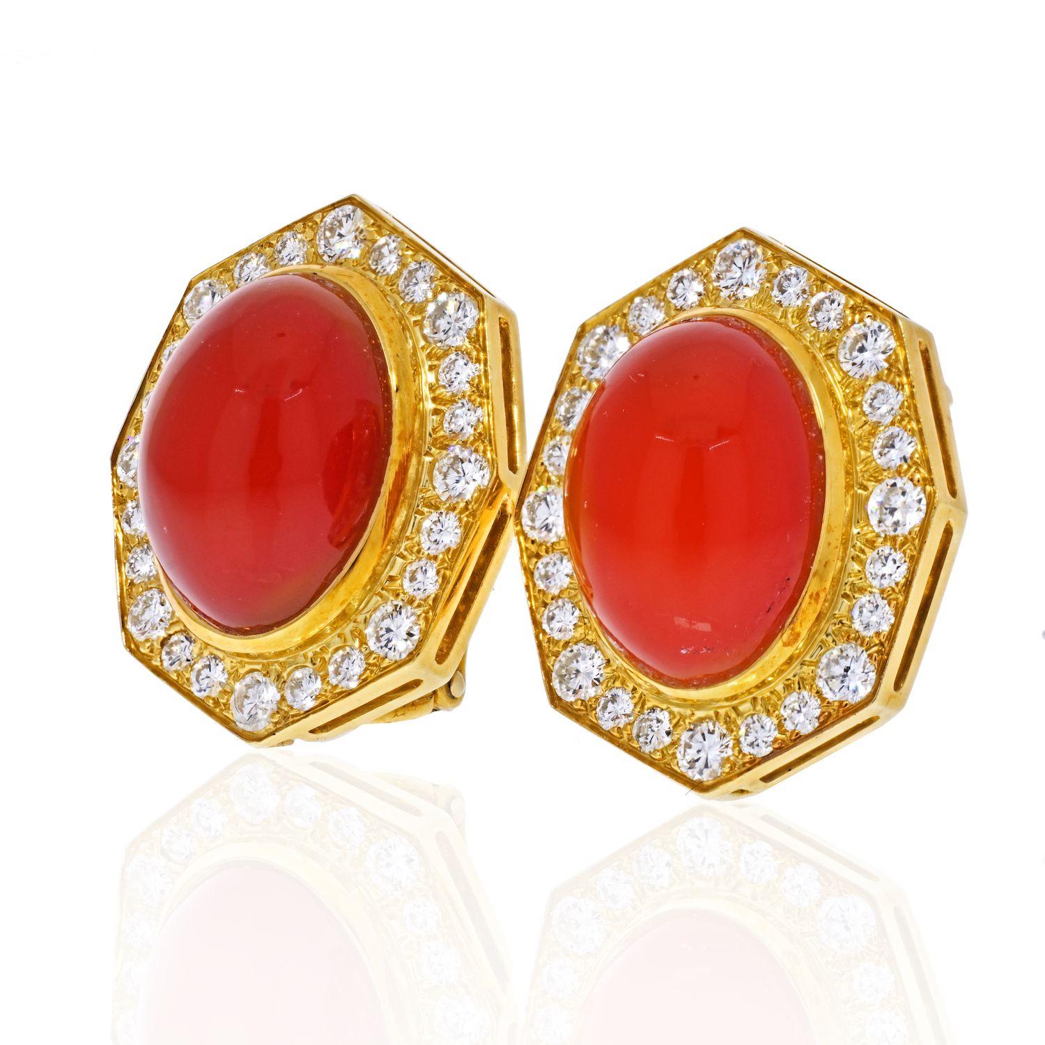 David Webb diamond and carnelian earrings. Containing two oval shape cabochon cut carnelian measuring approximately 14.75 x 10.80 x 7.20 mm and 48 round brilliant cut diamonds weighing approximately 1.60 carats total. Beautiful and subtle designer