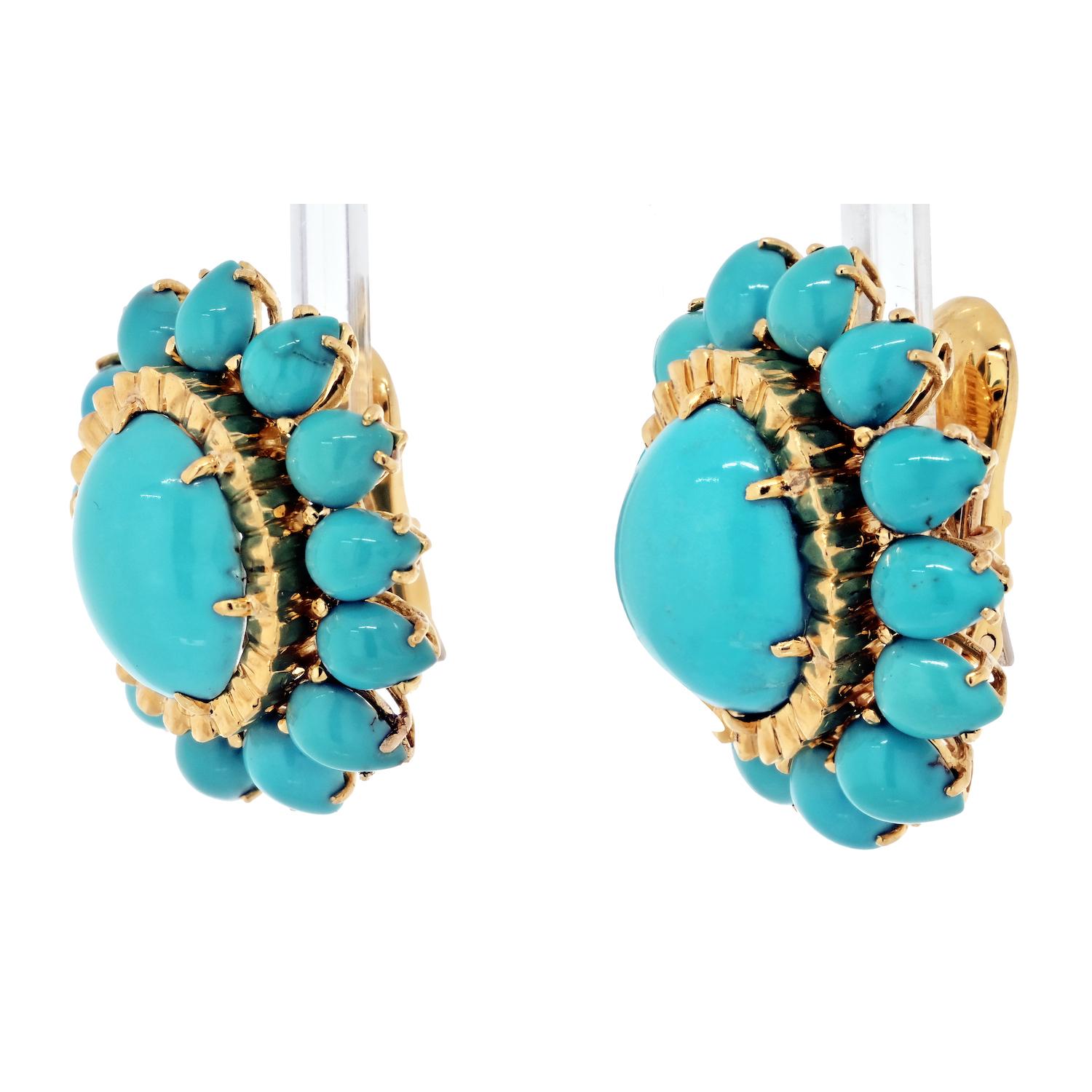 Introducing the David Webb 18K Yellow Gold Cabochon Cut Turquoise Flower Coral Clip-On Earrings – a truly enchanting and distinctive addition to your jewelry collection. Measuring approximately 1 inch in length, these earrings boast a design that