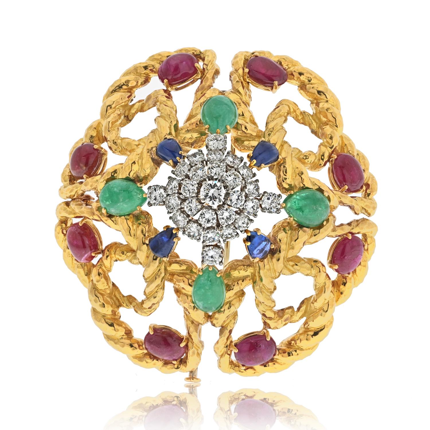 Elevate your jewelry collection with this exquisite David Webb Platinum & 18K Yellow Gold Multigem Openwork Brooch, a true testament to the designer's artistry. Measuring 6cm in width, this piece is a striking blend of color, elegance, and