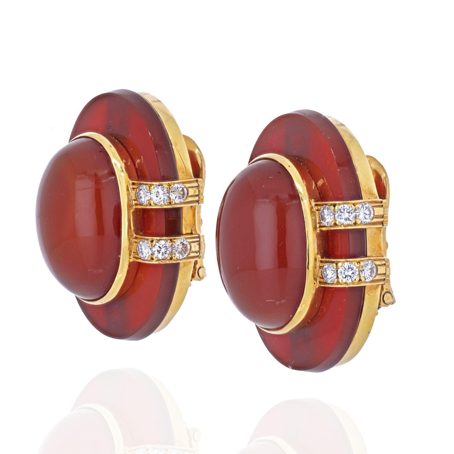 The perfect touch of red for any occasion, these tasteful David Webb Carnelian and Diamond oval cabochon clip earrings are sure to become an instant favorite. Fashioned in precious 18K gold, each dazzler showcases a vivid oval shaped cabochon