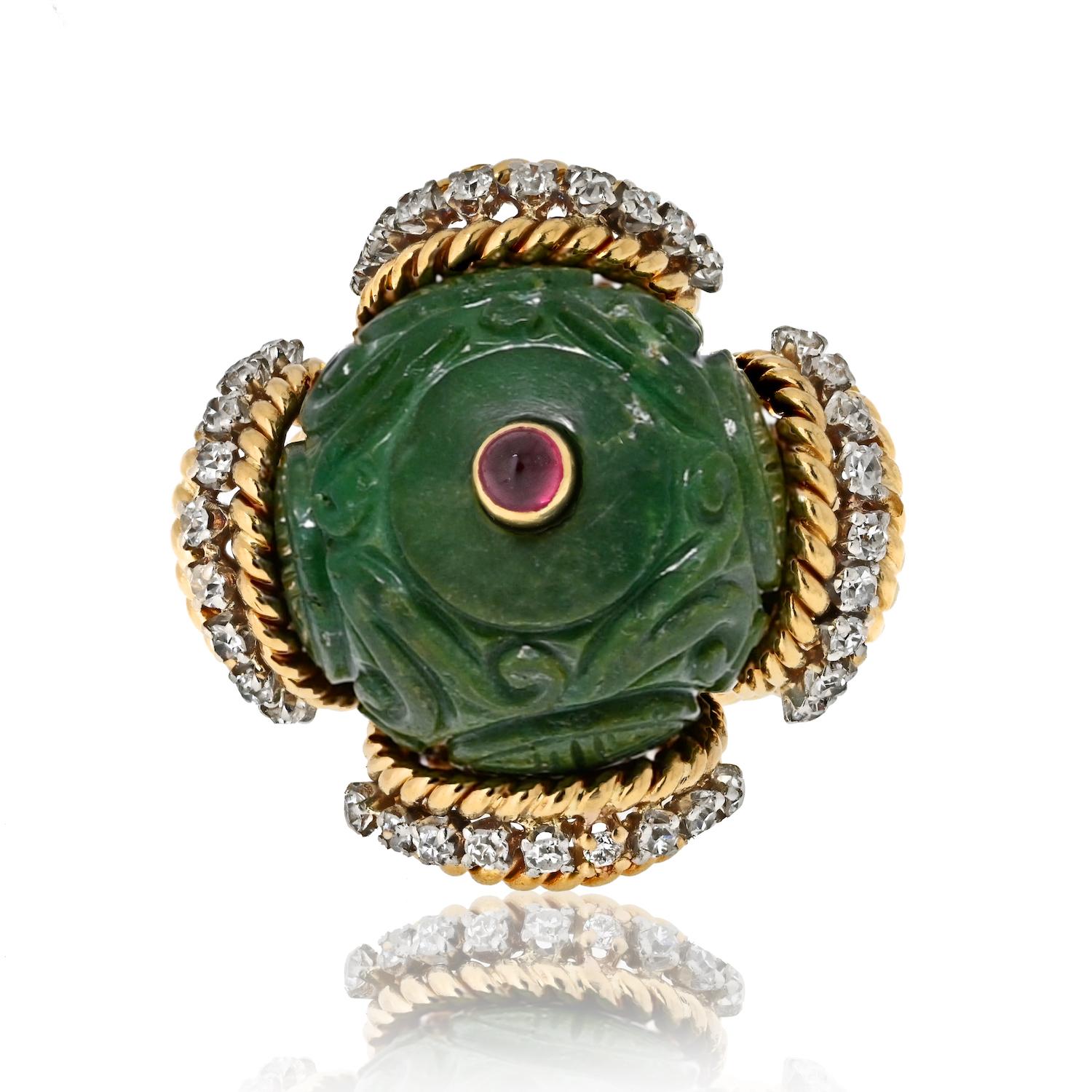 Discover the enchanting allure of this Vintage David Webb Platinum & 18K Yellow Gold Carved Jade, Diamond, and Ruby Ring. This extraordinary piece features a beautifully carved round-shaped jade at its center, exuding timeless elegance and a touch