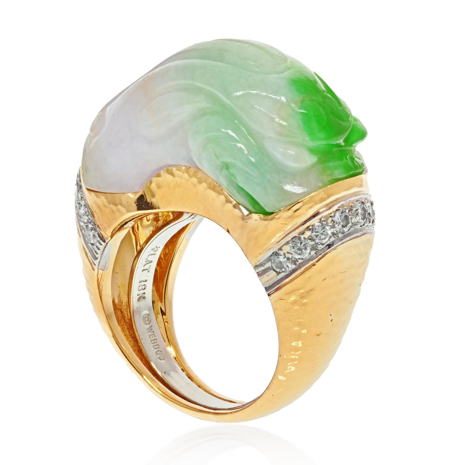 Embrace the allure of artistry with the David Webb Platinum & 18K Yellow Gold Carved Jade and Diamond Ring. This ring stands as a testament to meticulous craftsmanship and creative design, a remarkable fusion of elements that captures attention and