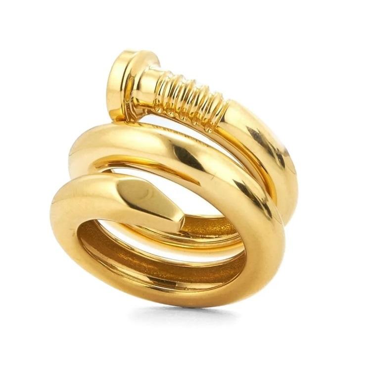 Gorgeous gold coiled nail ring by David Webb.
Stylized nail wrapping itself around your finger.

Width: 23 mm (ring), 5 mm (nail).
Size: 6.
Metal: 18k yellow gold.
Weight: 15.4 grams.
Hallmarked: 