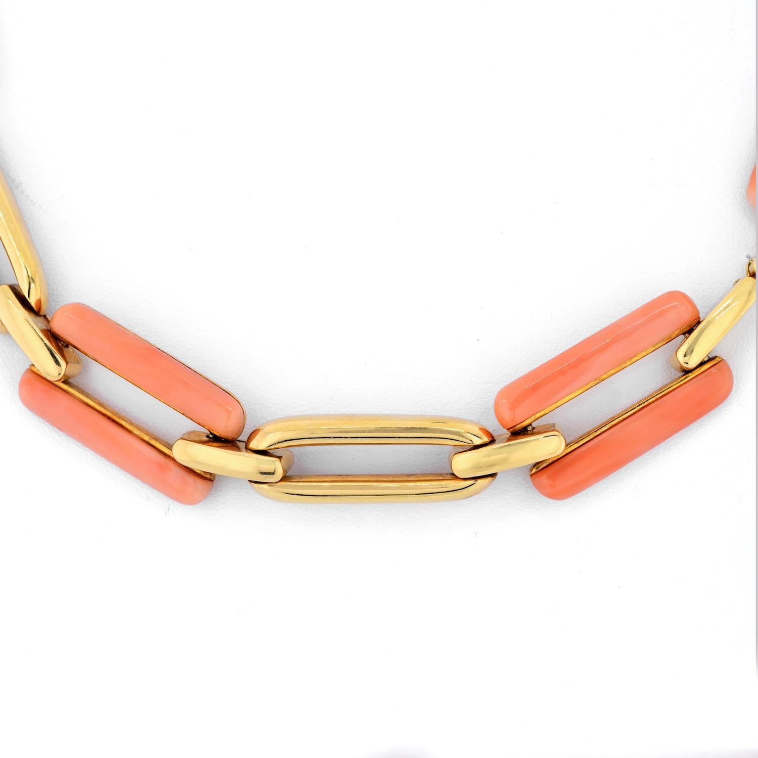 David Webb 18K Yellow Gold Pink Coral And Gold Link Convertible Necklace.
Lovely link necklace 20 inches long will be a perfect addition to your summer outfit. This necklace can also be worn as a bracelet.
