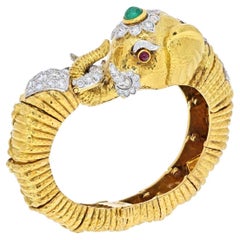 Vintage David Webb 18K Yellow Gold Diamond, Emerald Elephant Bracelet