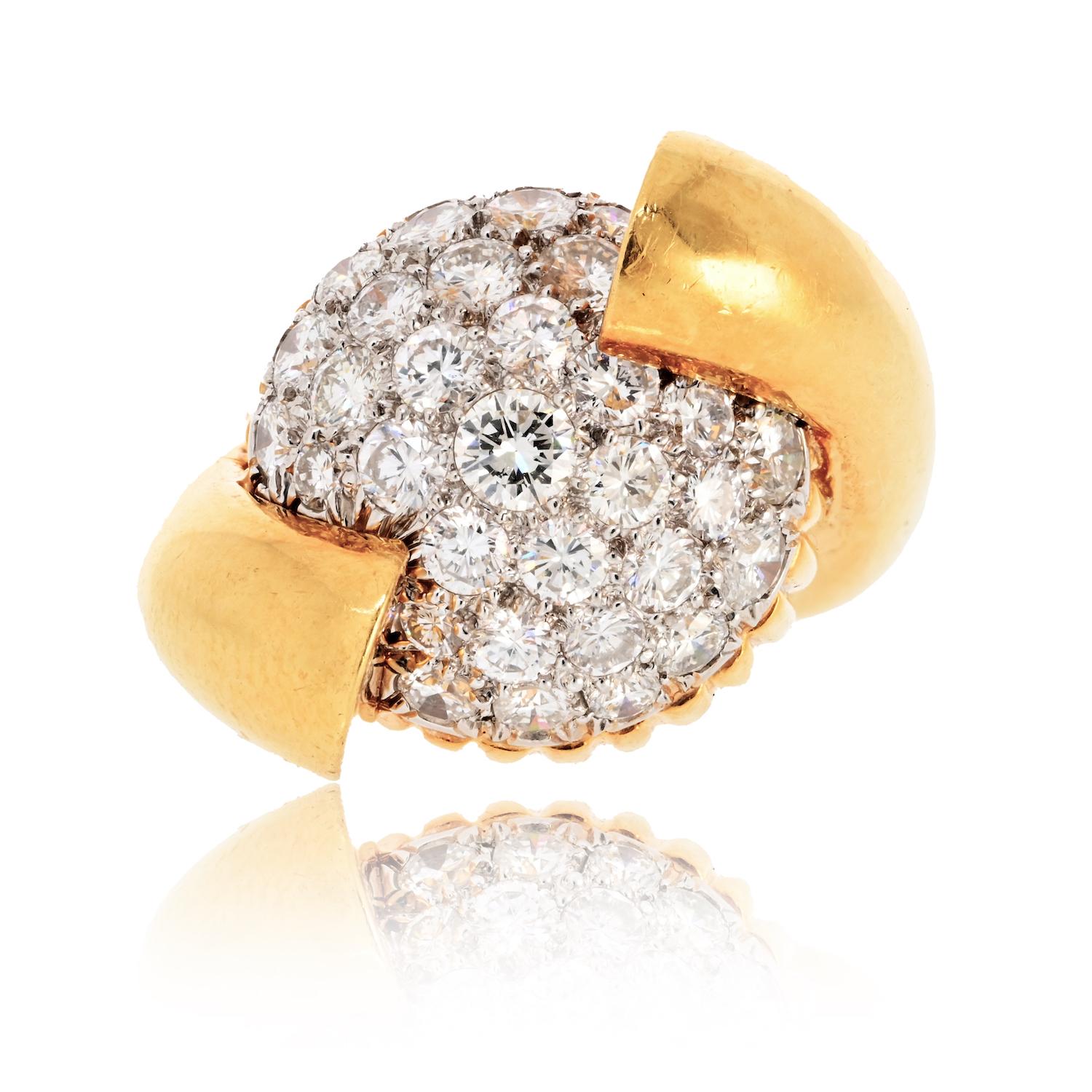 David Webb 18K Yellow Gold 1970s Pave-Set Diamond Vintage Cocktail Ring.  

A striking statement piece with a unique twist, this vintage David Webb ring captures the bold and distinctive style the designer is known for. Crafted from solid 18K yellow