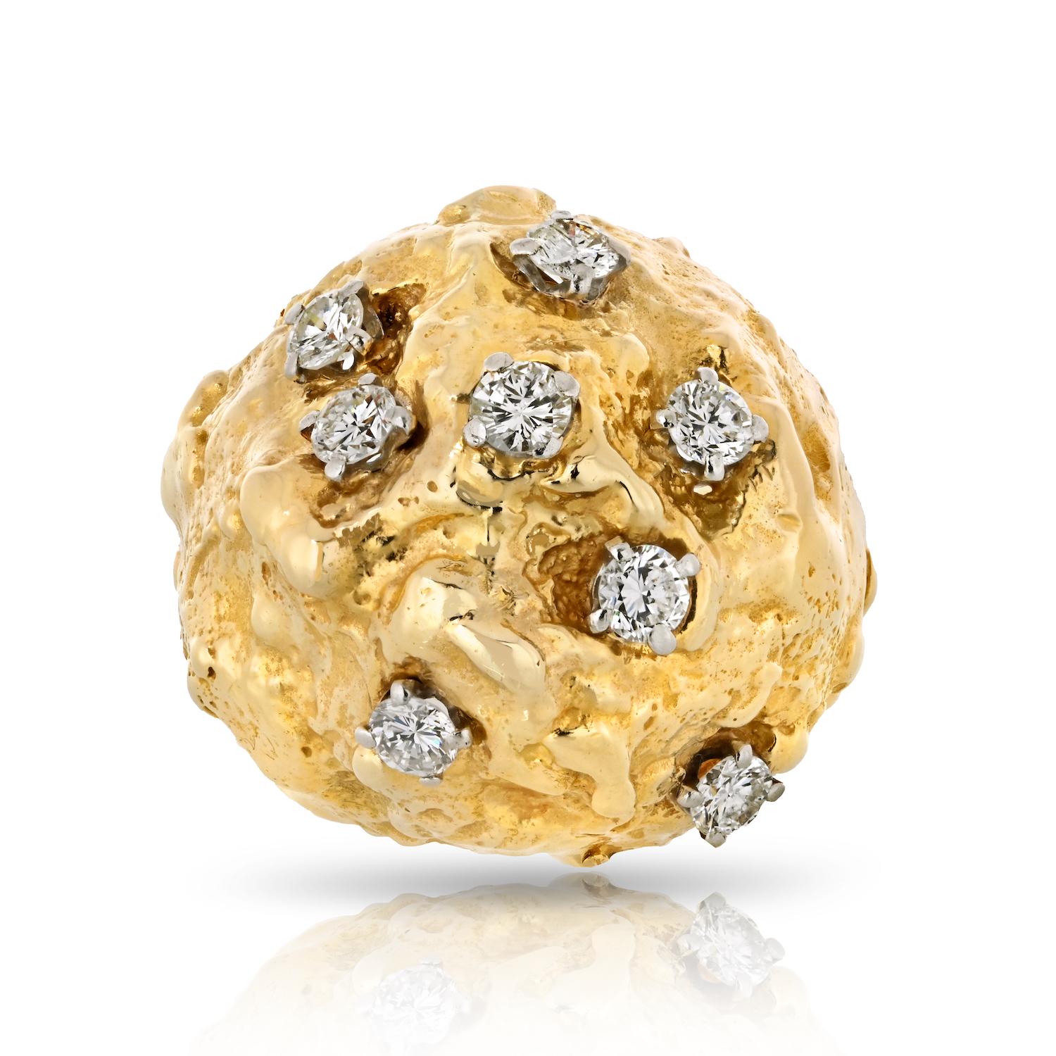 Behold a remarkable piece from the 1970s the David Webb Platinum & 18K Yellow Gold Hammered Diamond Dome Ring. This exquisite ring is a testament to timeless style and expert craftsmanship. Its captivating design showcases 8 brilliant round-cut