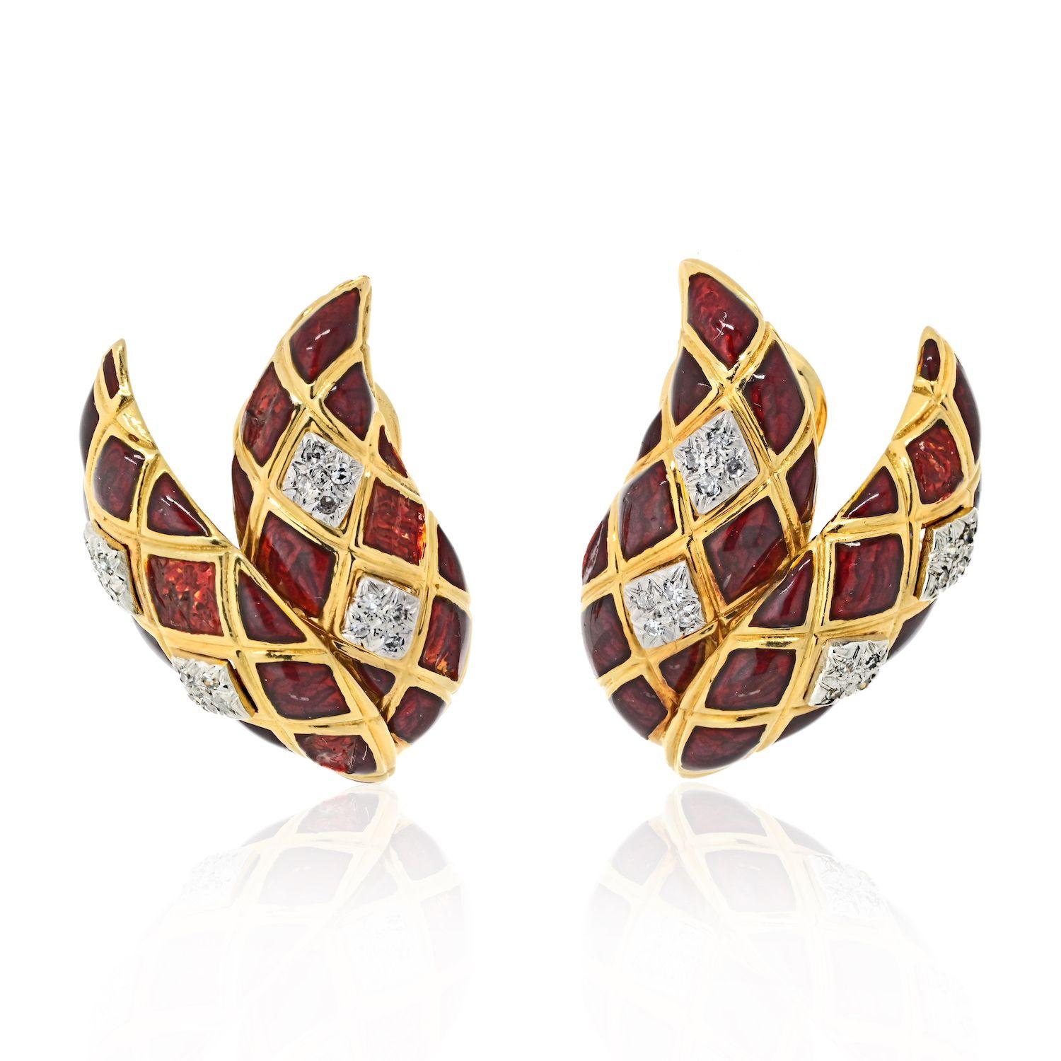 David Webb was a renowned American jewelry designer known for his bold and artistic creations. One of his iconic pieces is the 18k gold clip back earrings fashioned in a double leaf motif style with red enameling and a checkerboard pattern. The