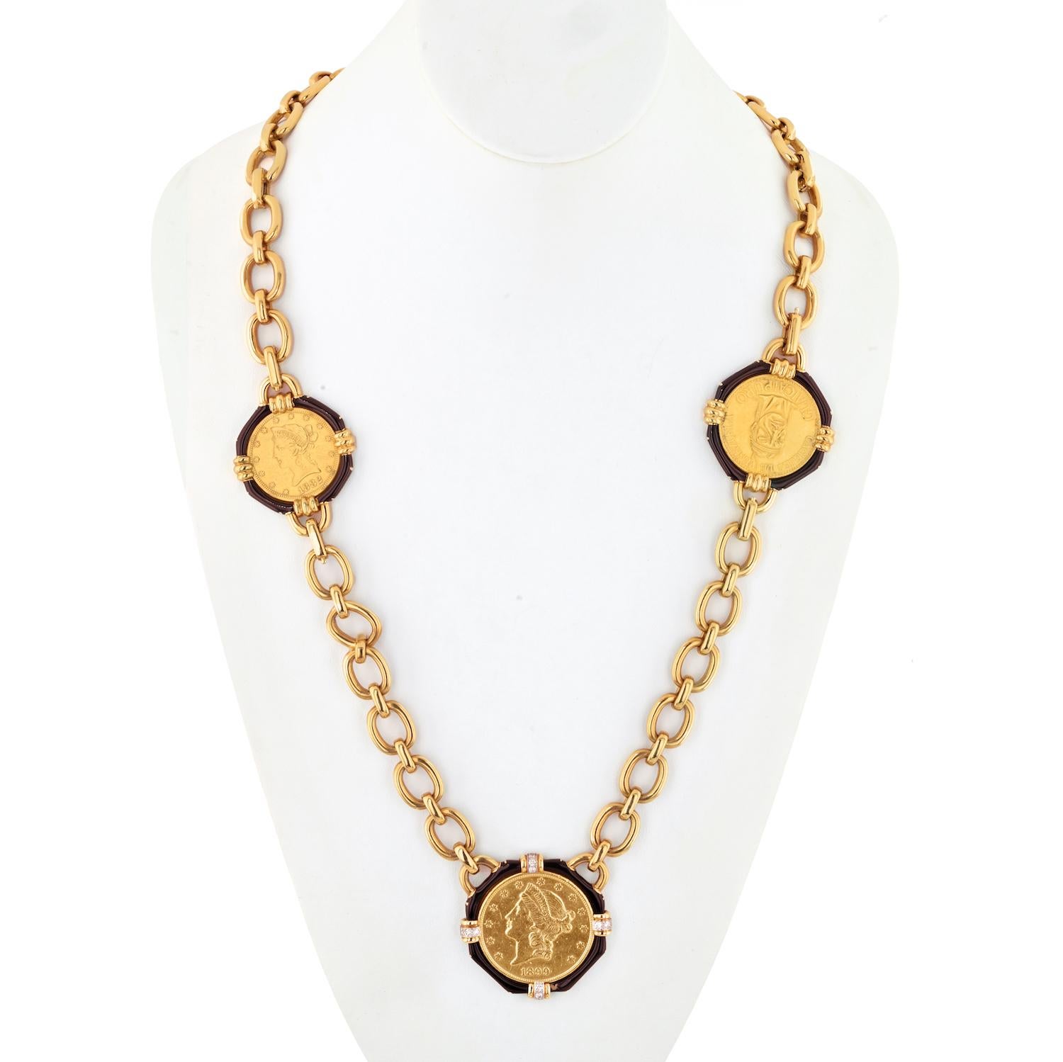 Drape yourself in opulence with the David Webb 18K Yellow Gold 5 Coin Black Enamel Long Link Necklace, an extraordinary piece that seamlessly marries craftsmanship and heritage. This 36-inch necklace, designed by David Webb, offers not only a